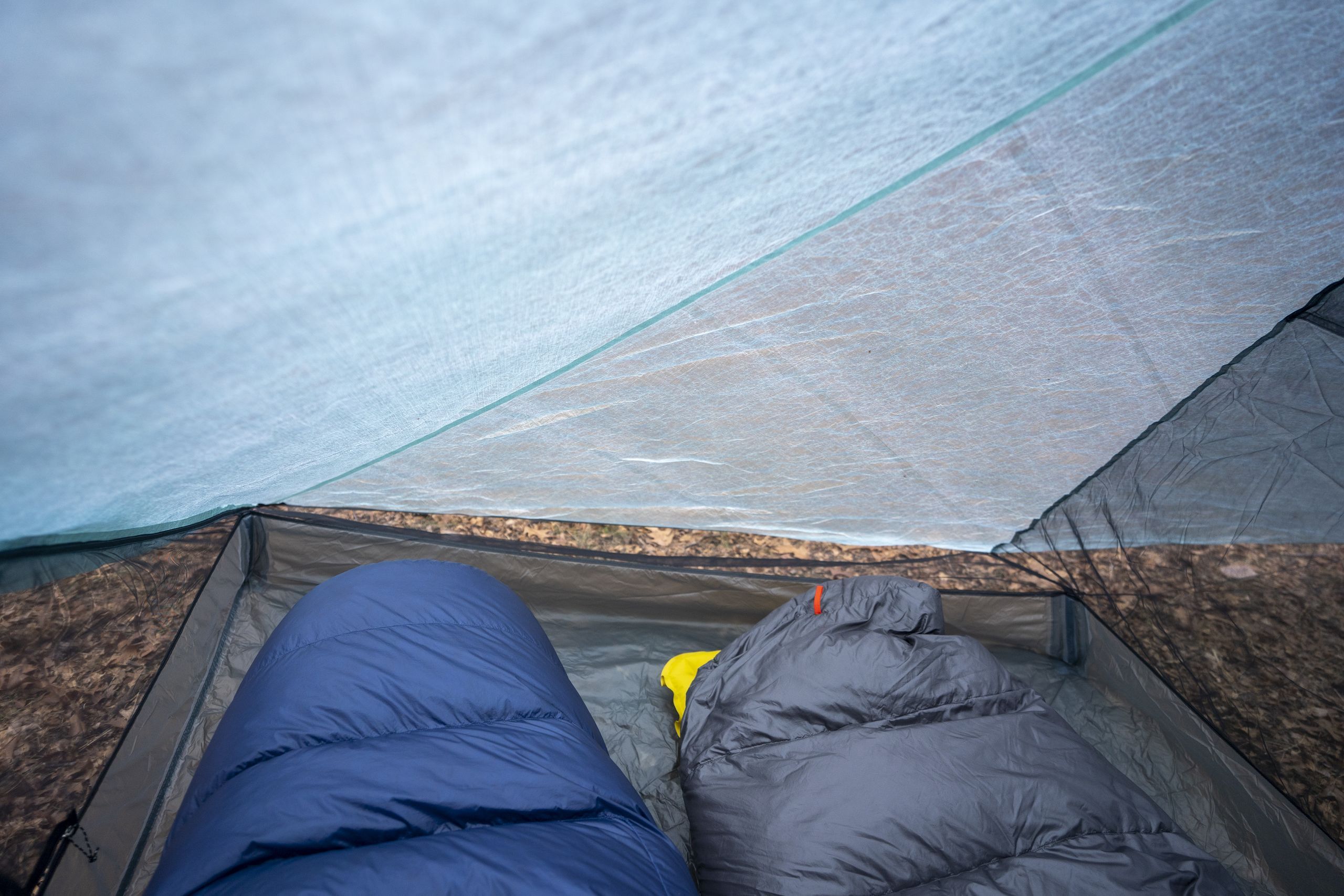 two sleeping bags extend into a two person tent interior