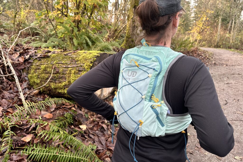 Runner wearing the Ultimate Direction Ultra Vesta 6.0 Hydration Vest