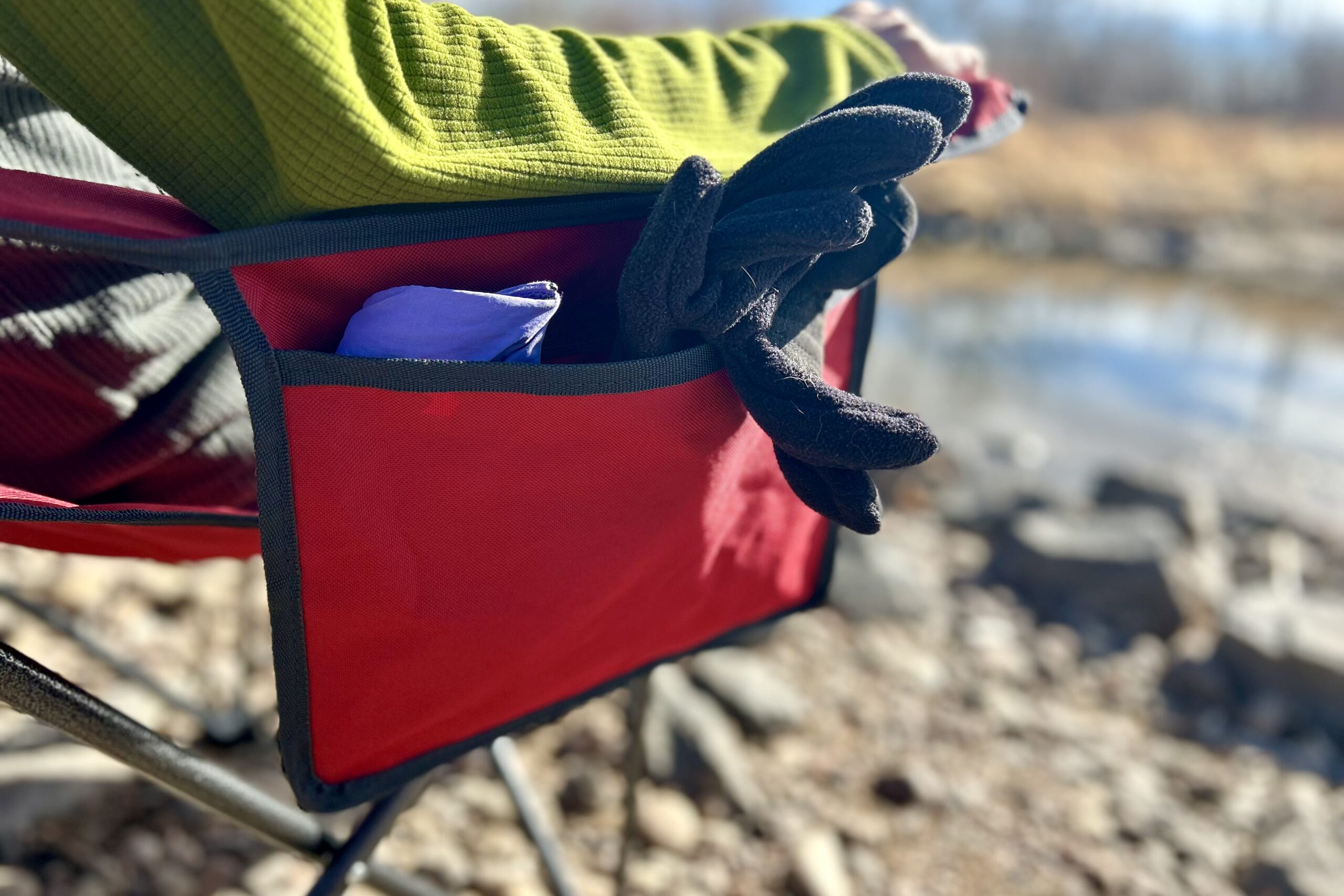 Close up of a camping chair's storage pocket.