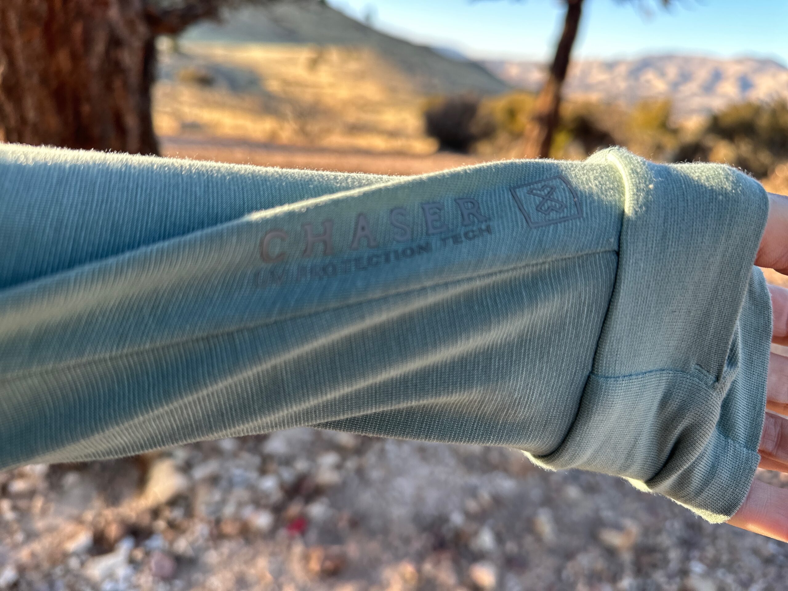 close up of sun shirt sleeve with word chaser on it