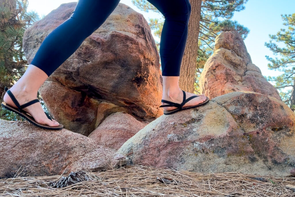 Our tester wearing the Earth Runner Alpha sandals on a hike.