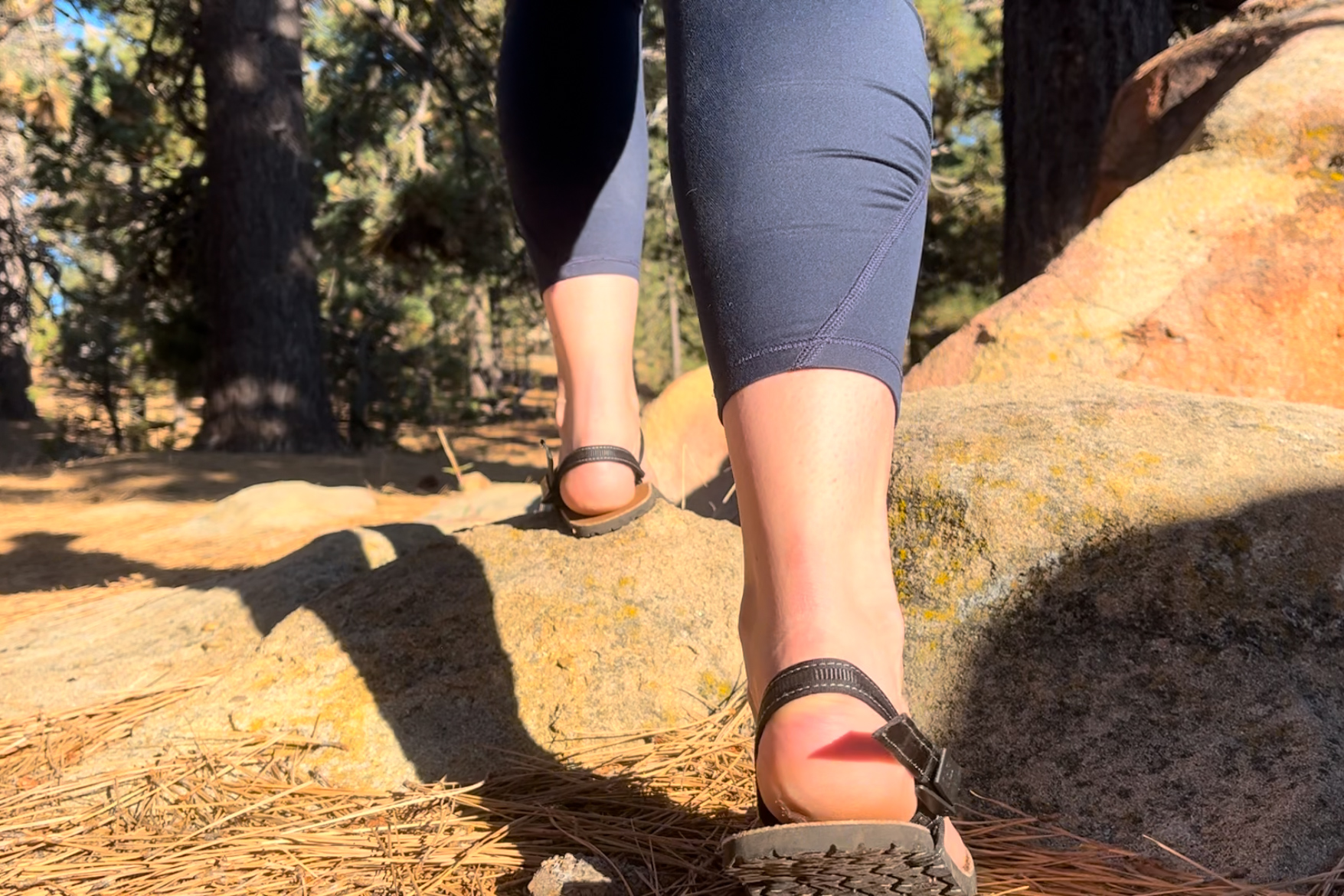 Our tester wearing the Earth Runner Alpha sandals on a hike.