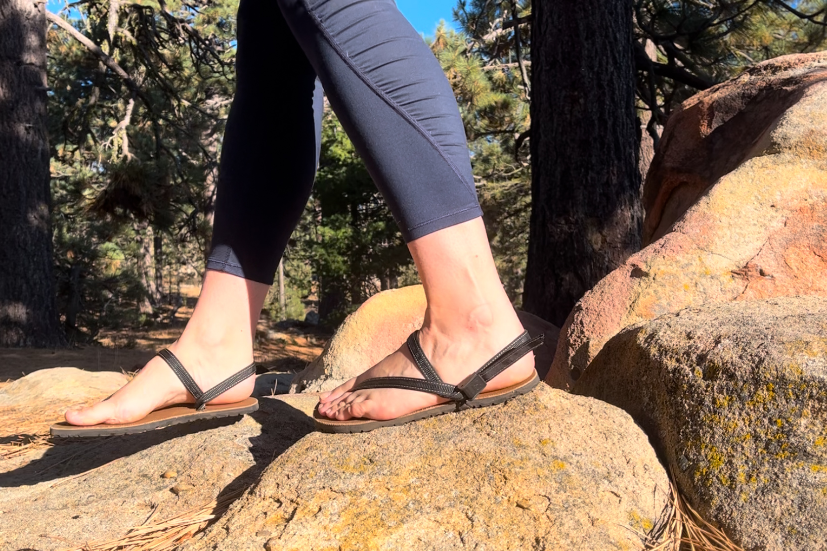Our tester wearing the Earth Runner Alpha sandals on a hike.