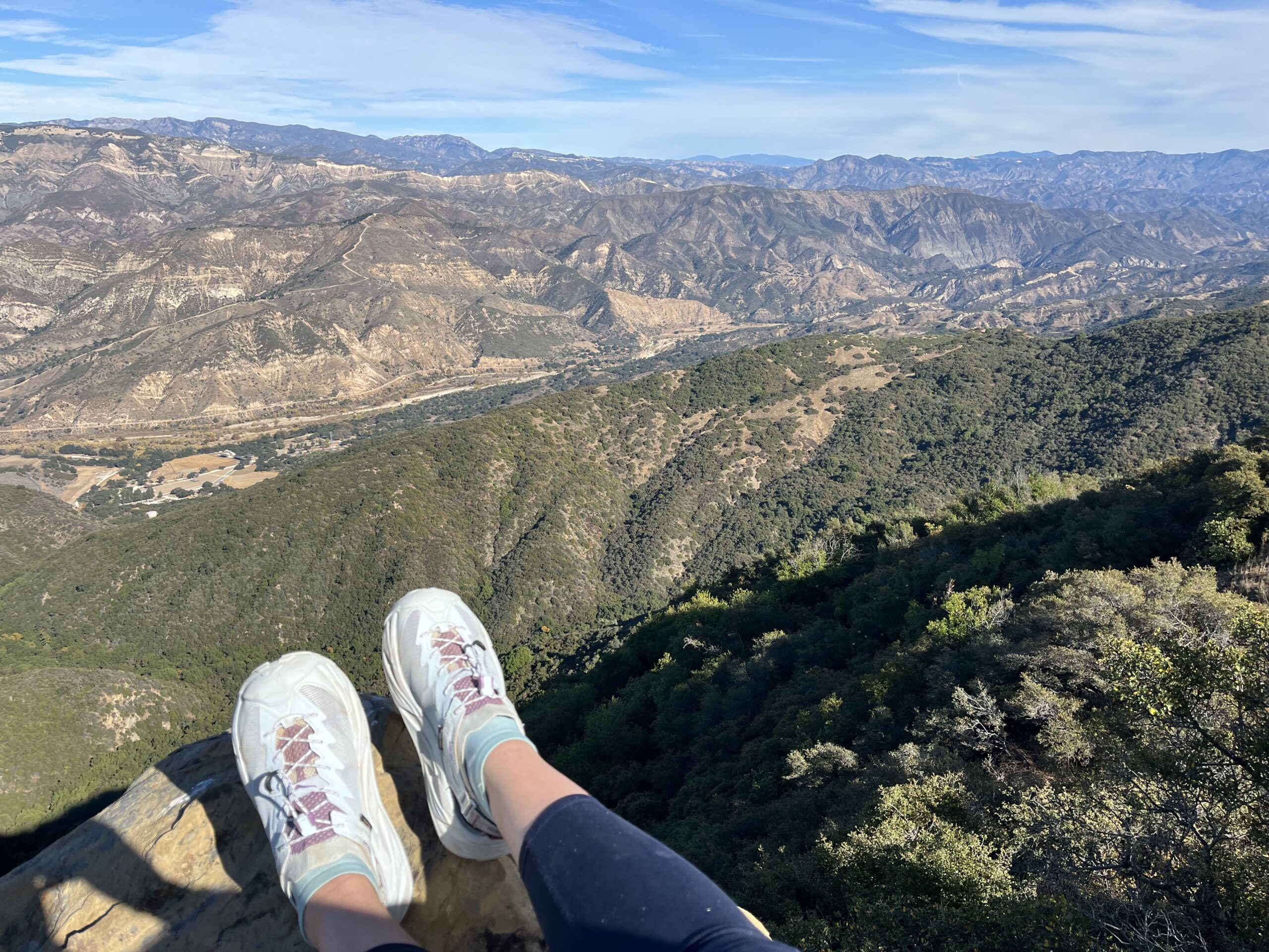 Our tester wearing the HOKA Hopara 2 sandals on a hike.