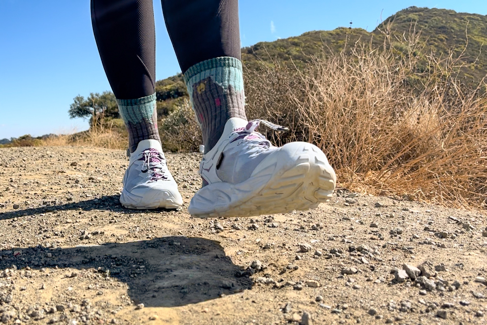 Our tester wearing the HOKA Hopara 2 sandals on a hike.