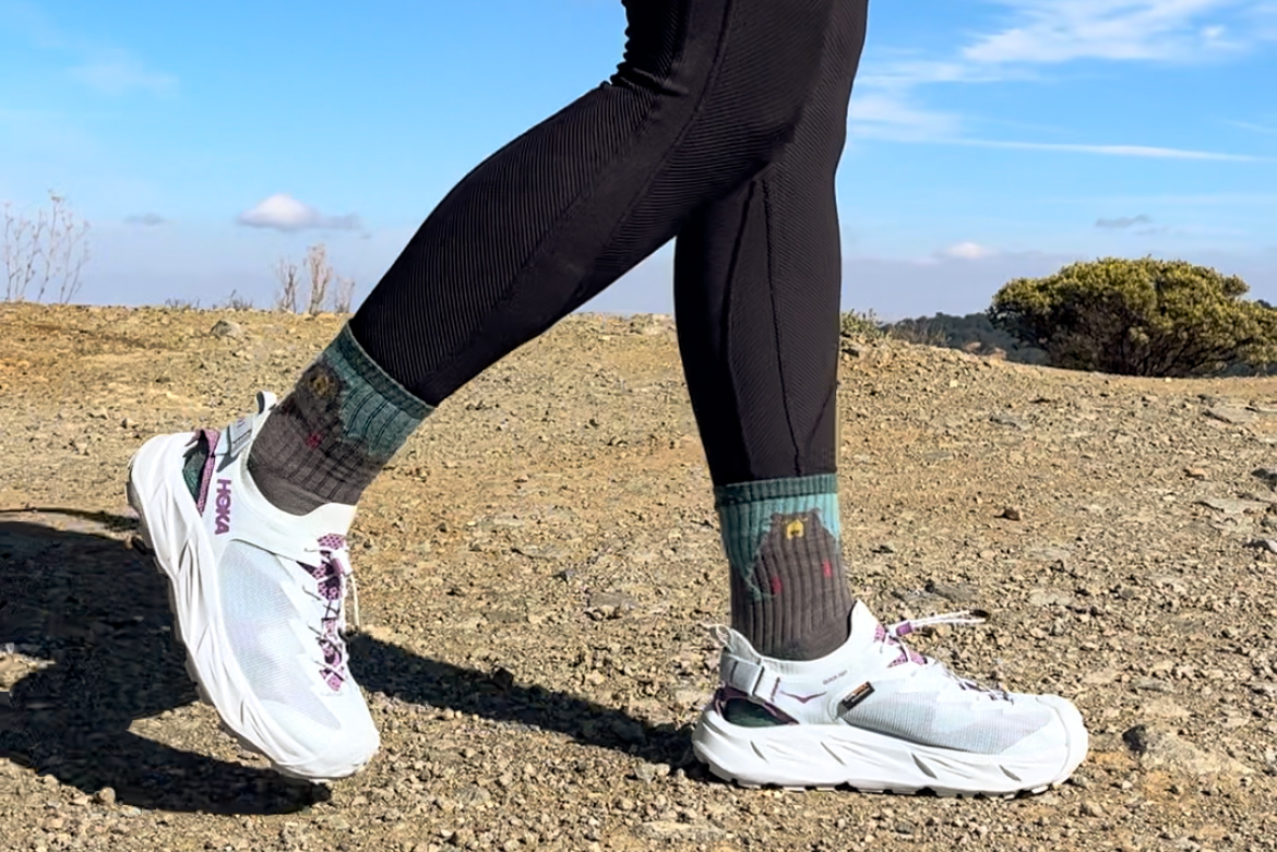 Our tester wearing the HOKA Hopara 2 sandals on a hike.
