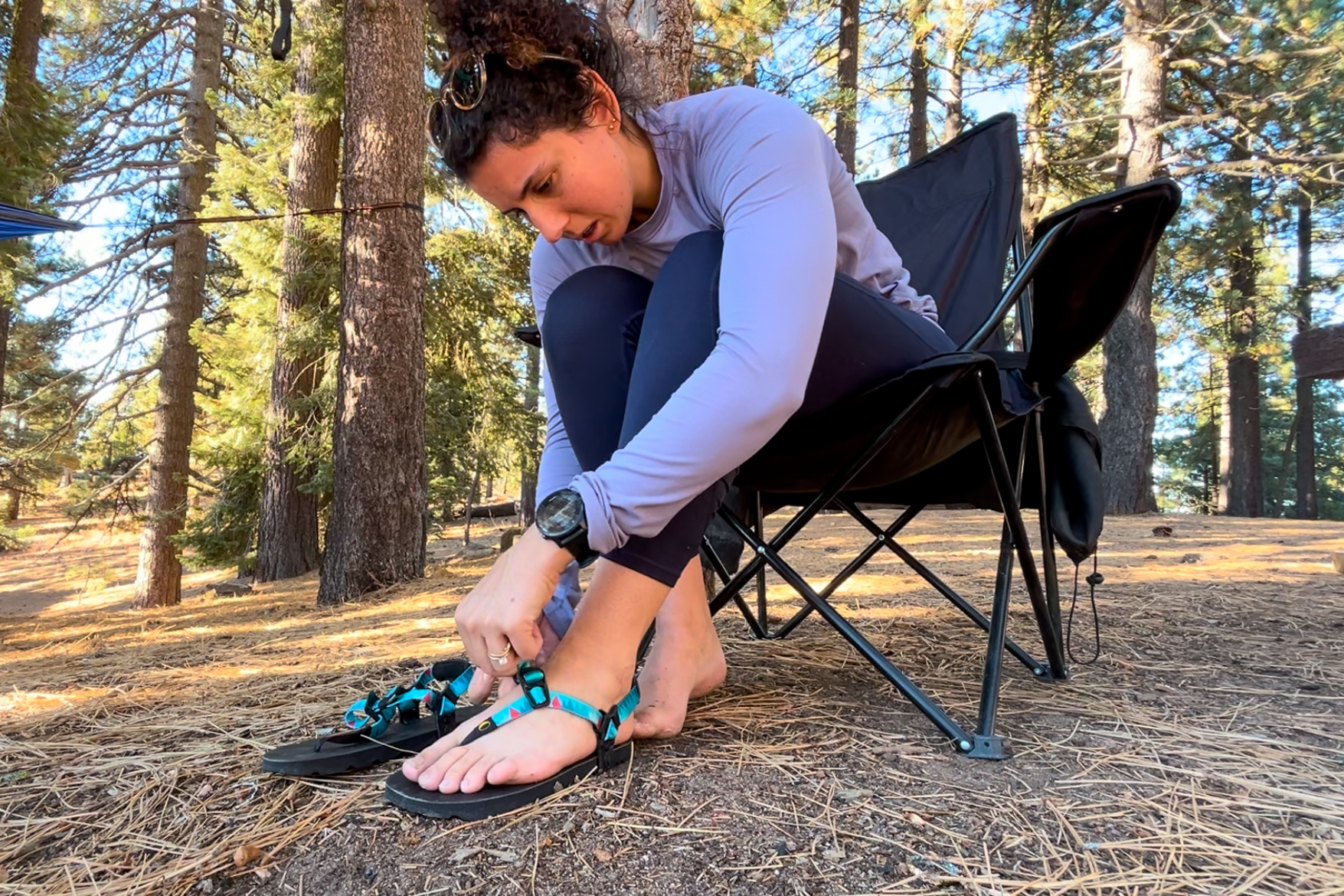 Our tester adjusting the Luna Mono Winged edition sandals.