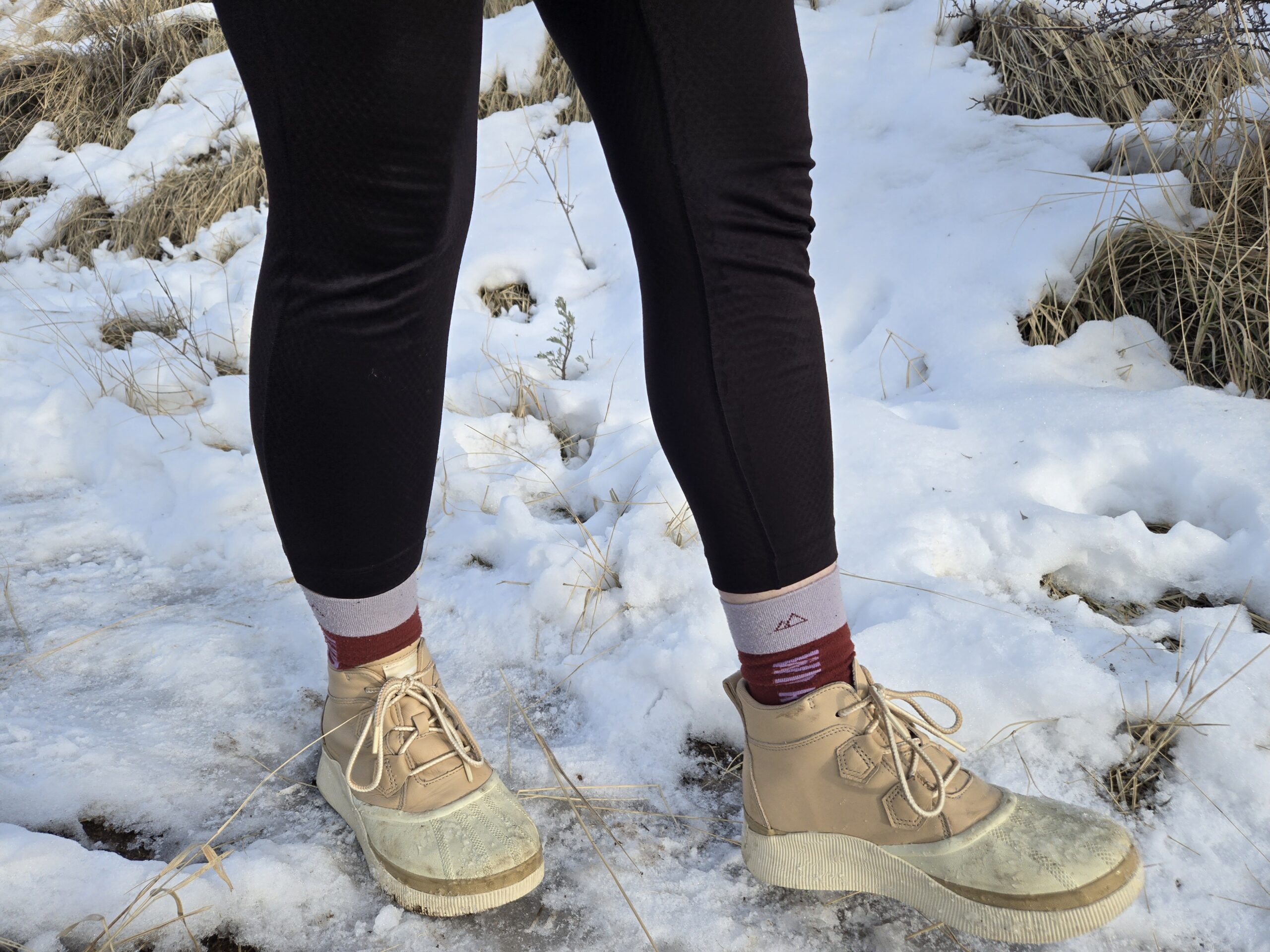 woman walking on snow in sorel out-n-about IV's