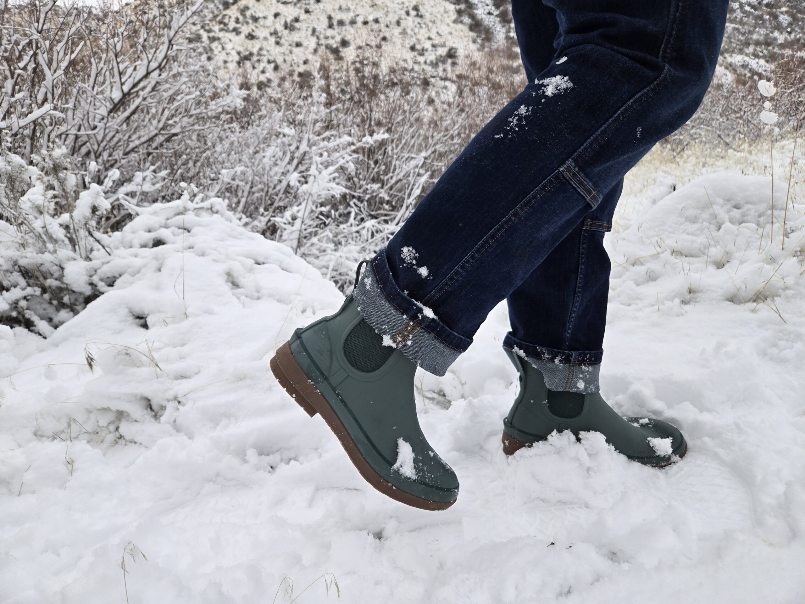 someone in jeans and bogs amanda chelseas walking in the snow