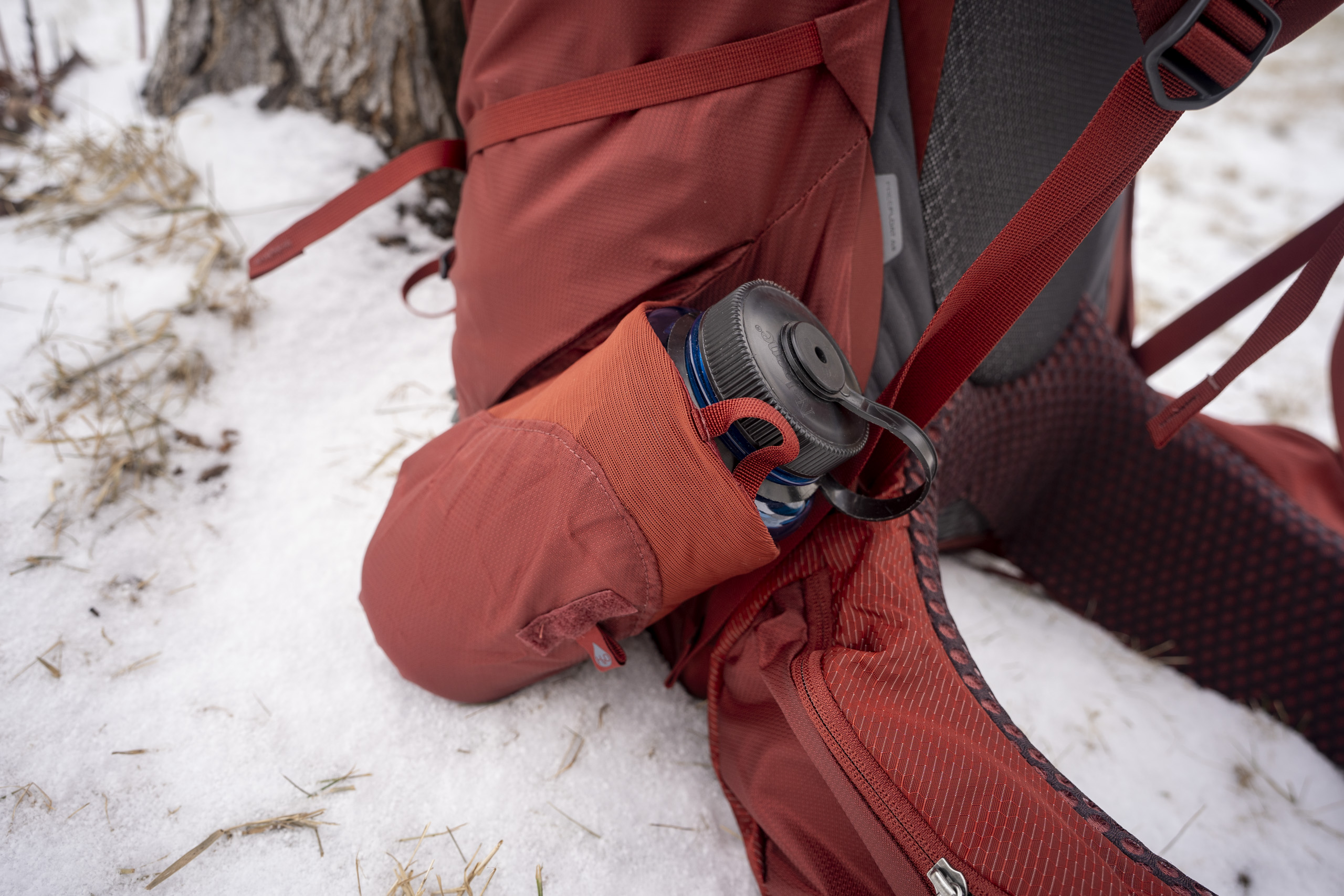 water bottle in side pocket of backpack
