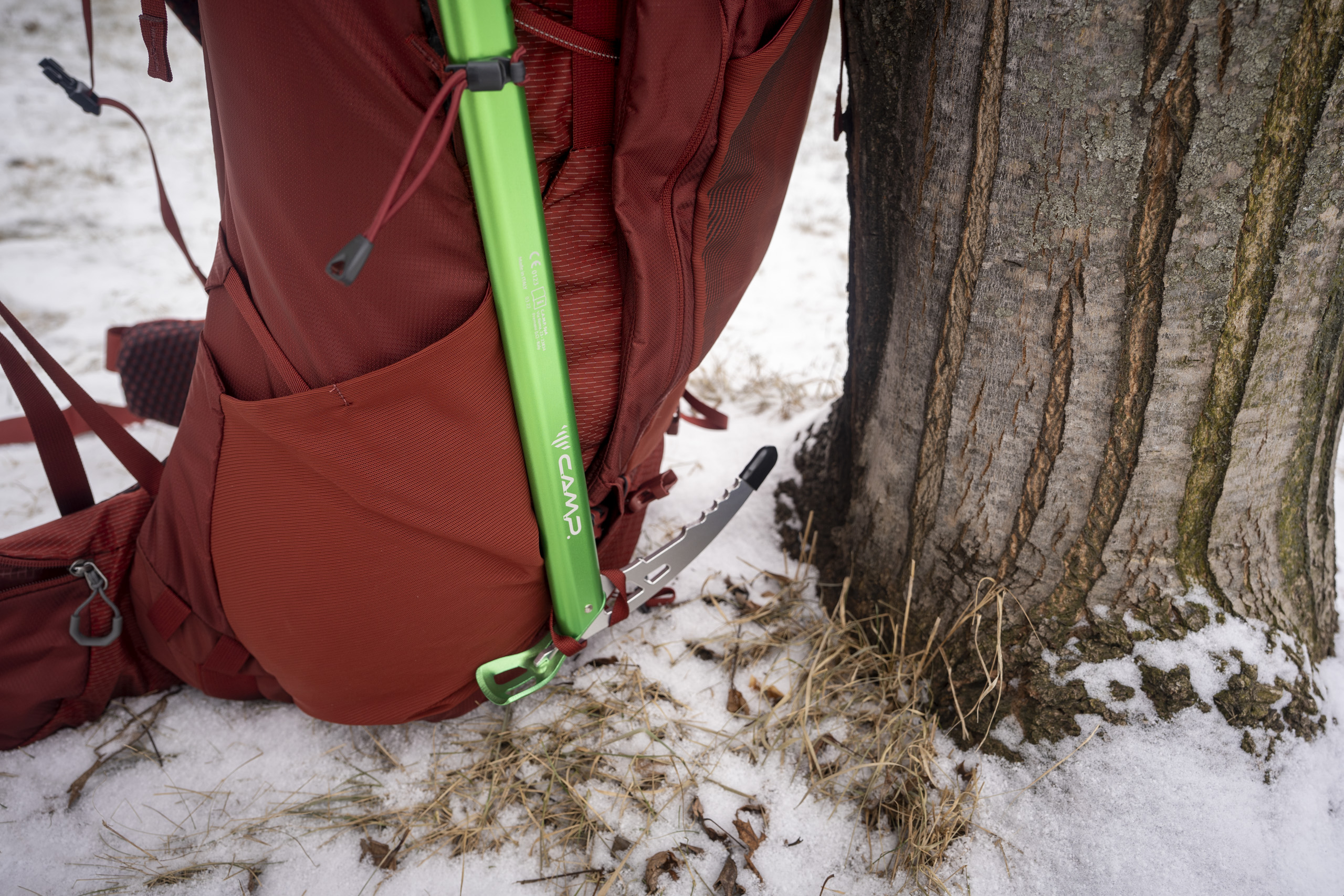 ice axe attached to a backpack