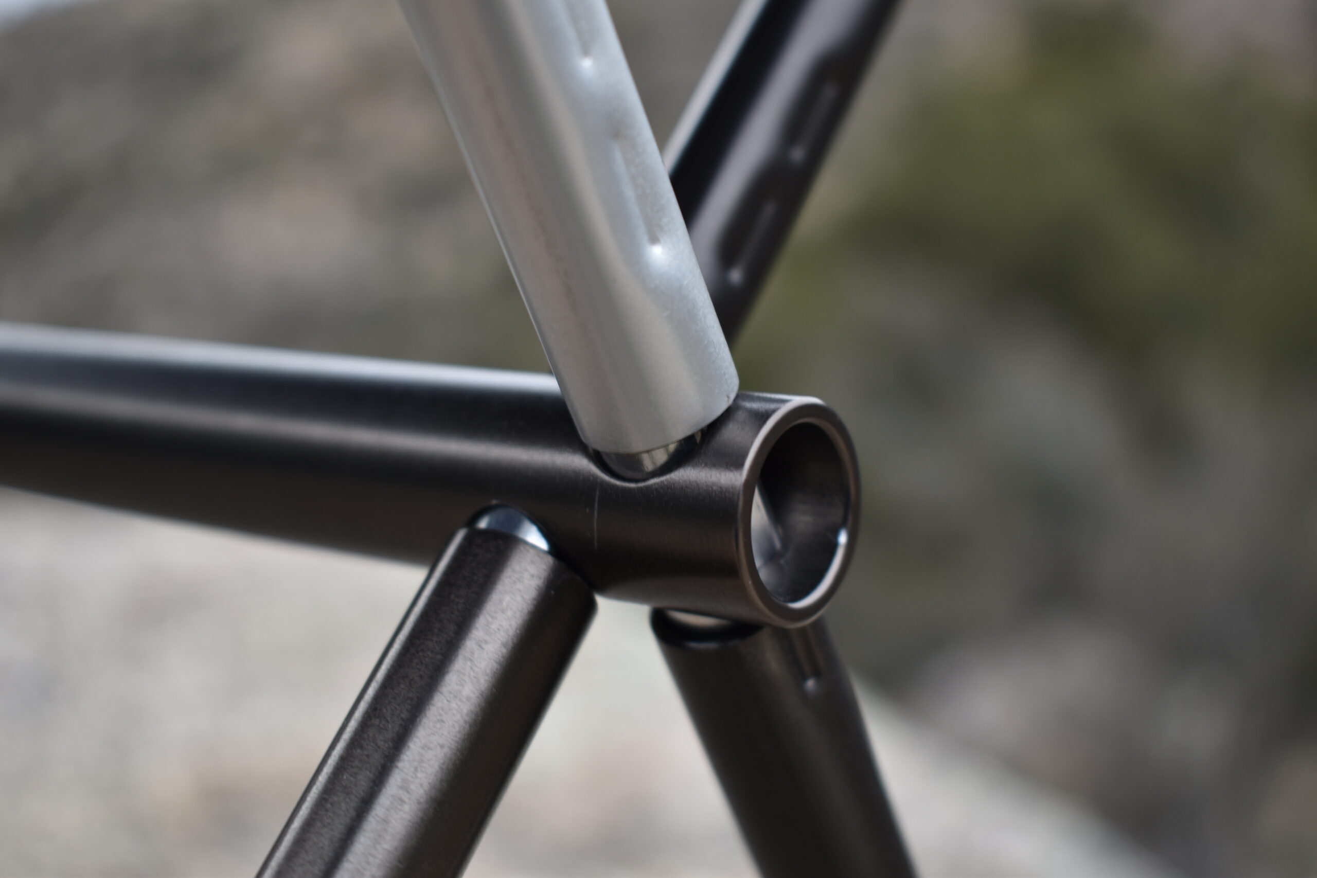 Close up of aluminum poles and chair legs connecting to form the base of the Big Agnes Skyline UL chair