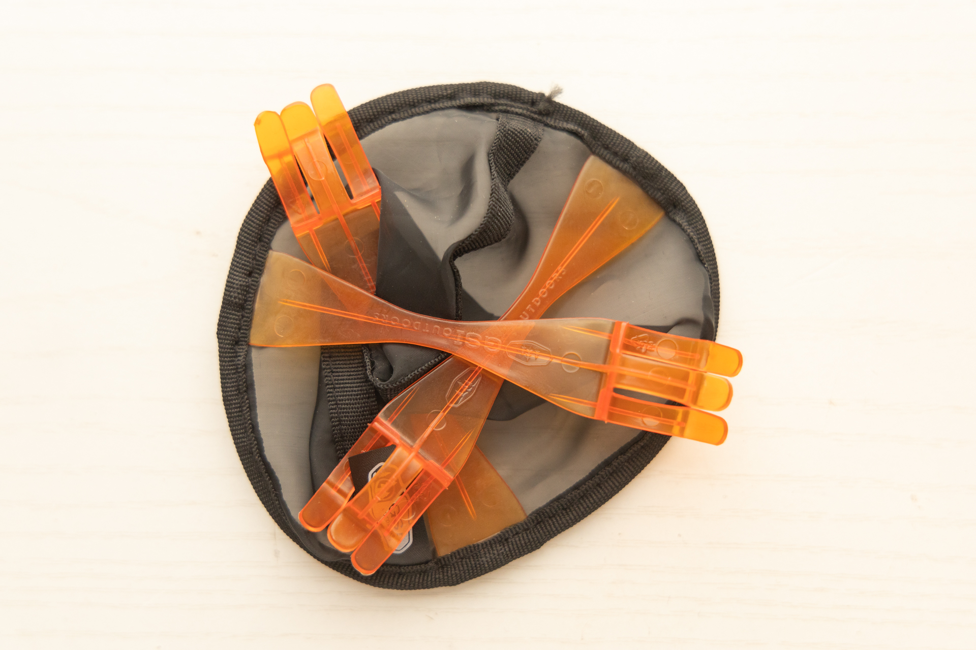 The GSI Ultralight Java Drip with lags folded across it so it packs flat.