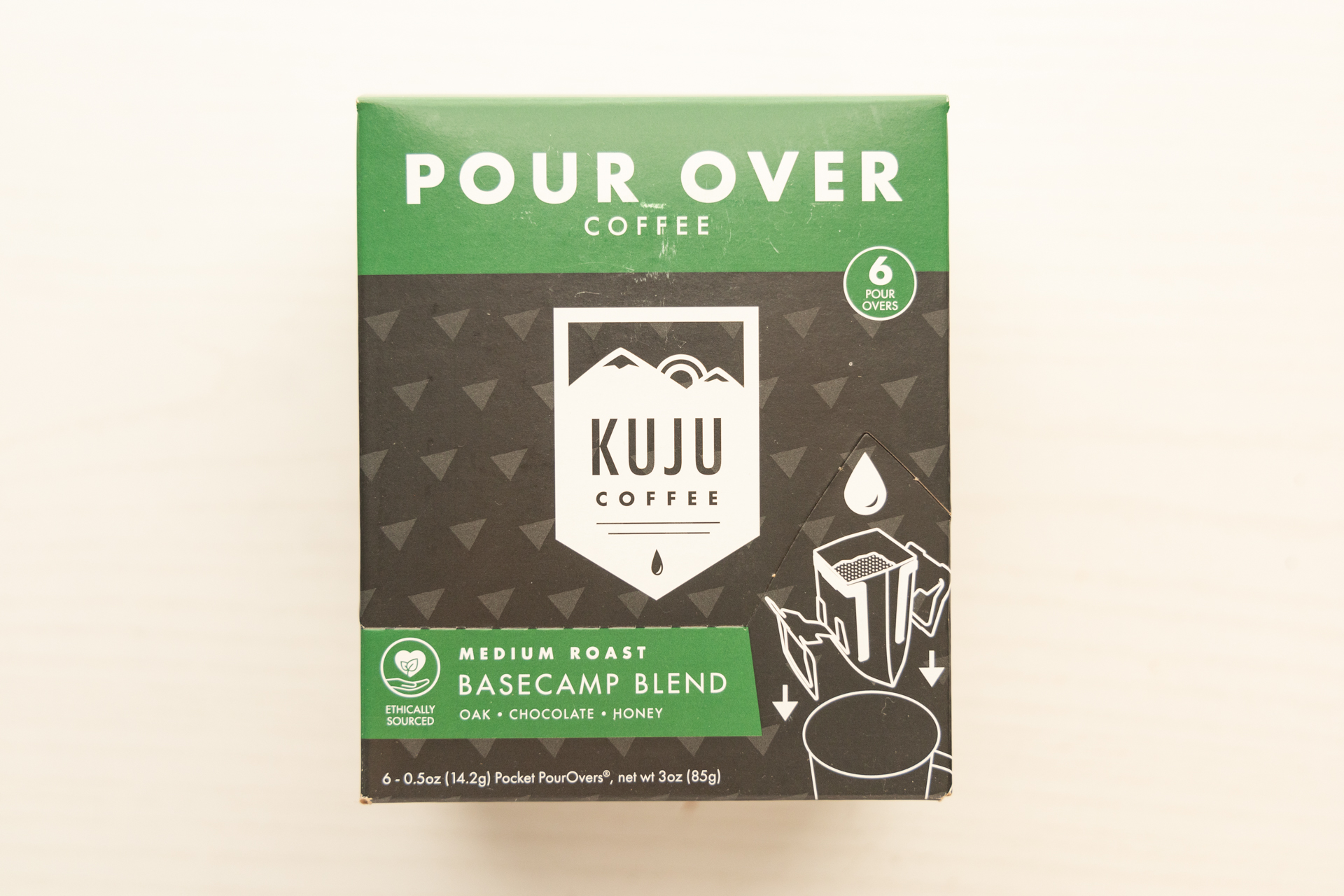 A box of Kuju Single-Serve Pour-Over packets.