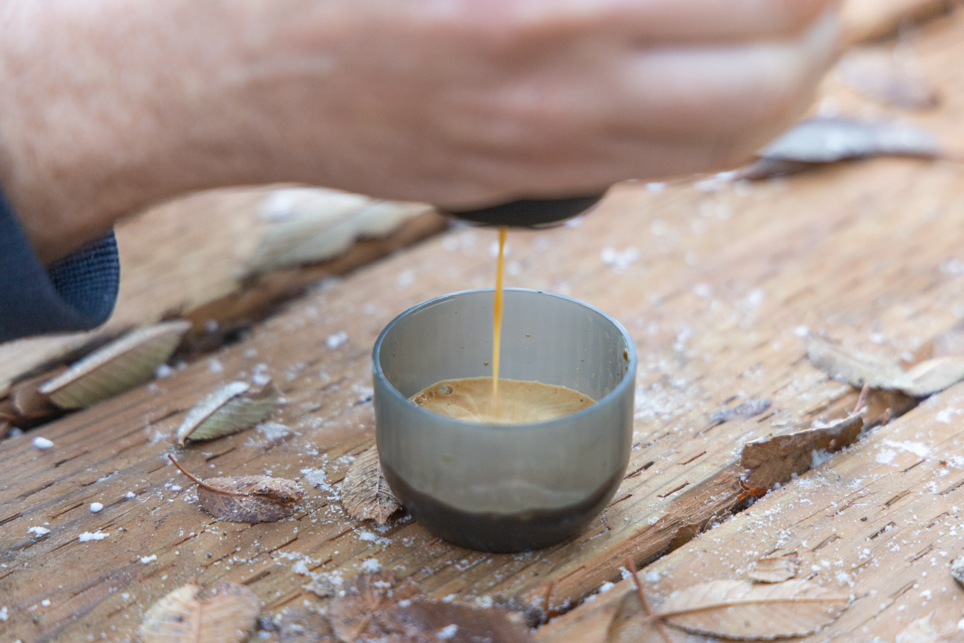 Extracting a shot of espresso with the Wacaco Minipresso.