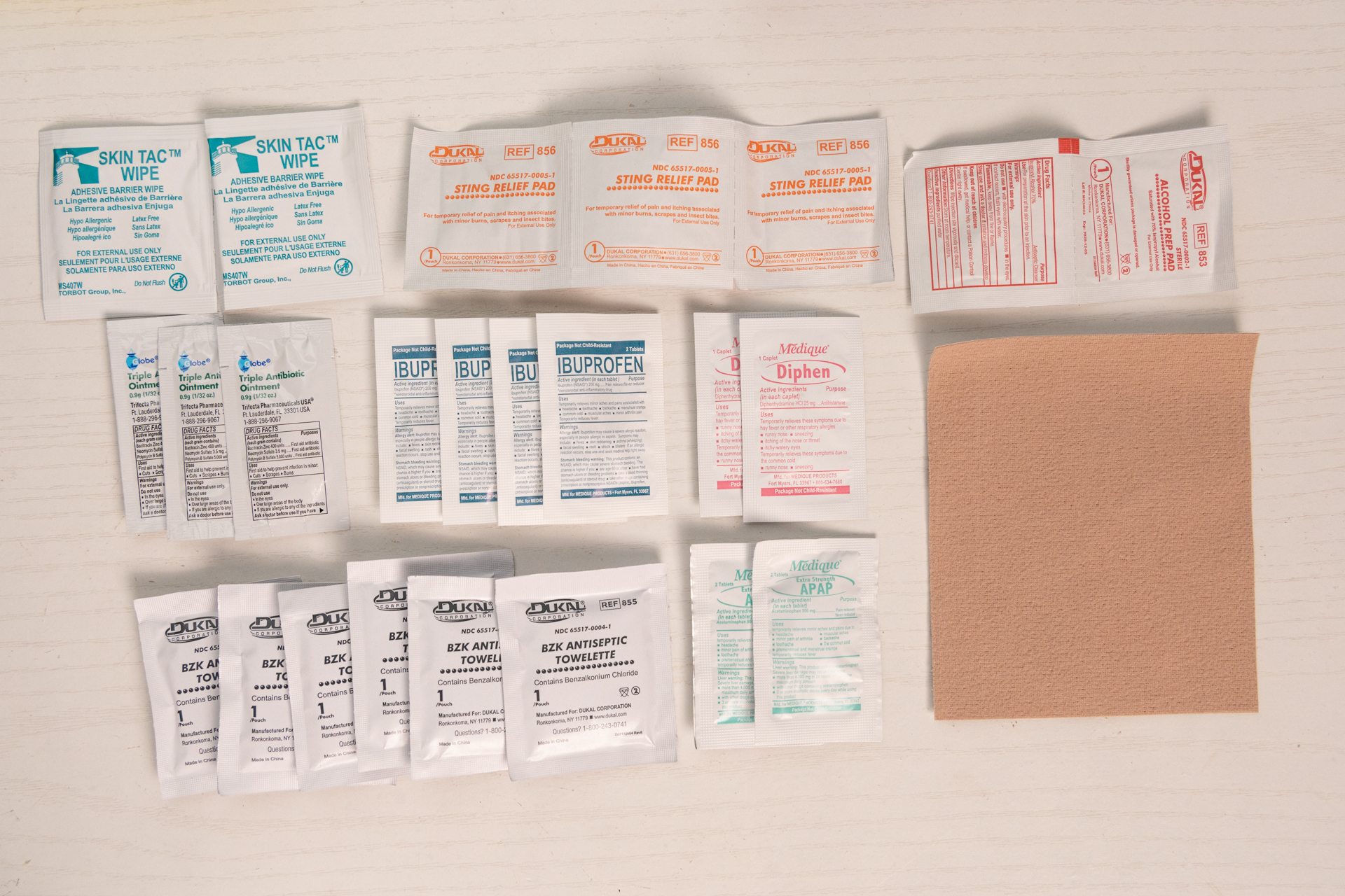 Some of the first aid supplies in the Adventure Medical Kits Ultralight.