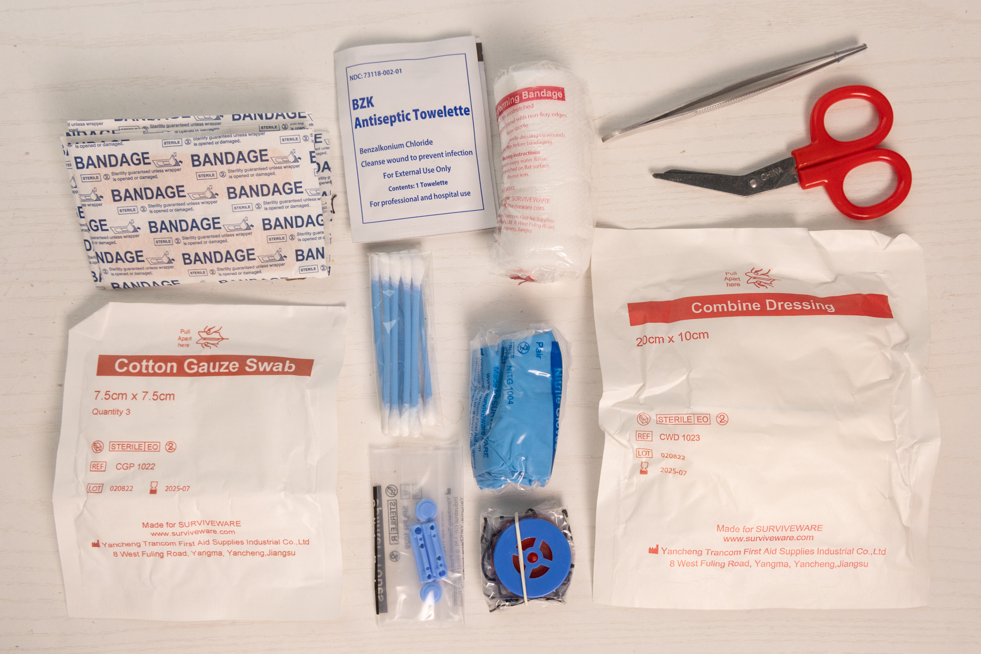 Most of the first aid supplies in the Surviveware Small.