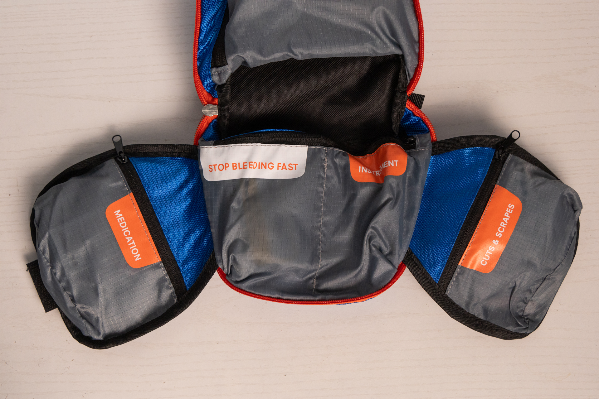 The Adventure Medical Kits Backpacker contains two fold-out wings with several more labeled pockets to organize supplies.