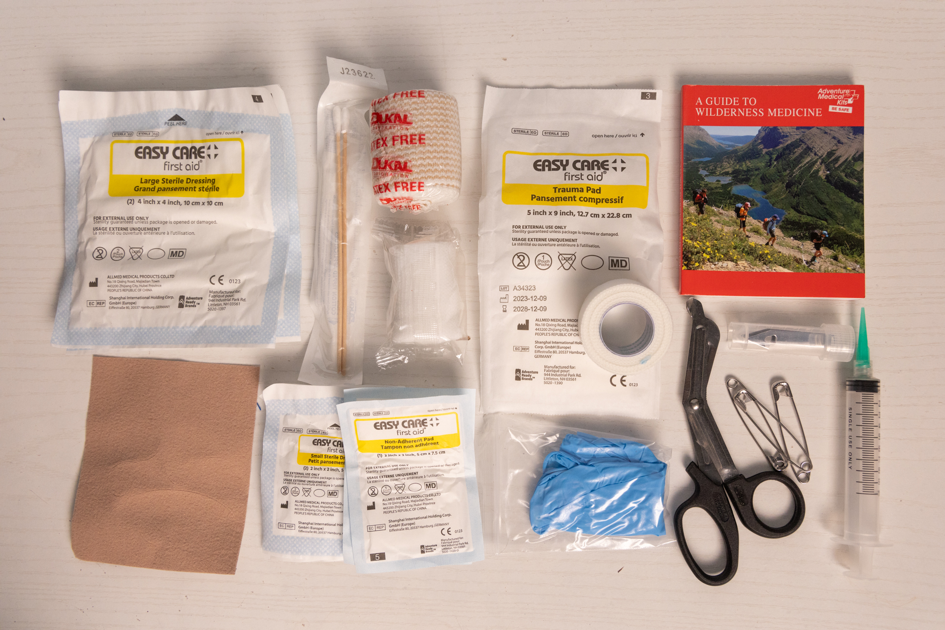 Some supplies in The Adventure Medical Kits Backpacker.