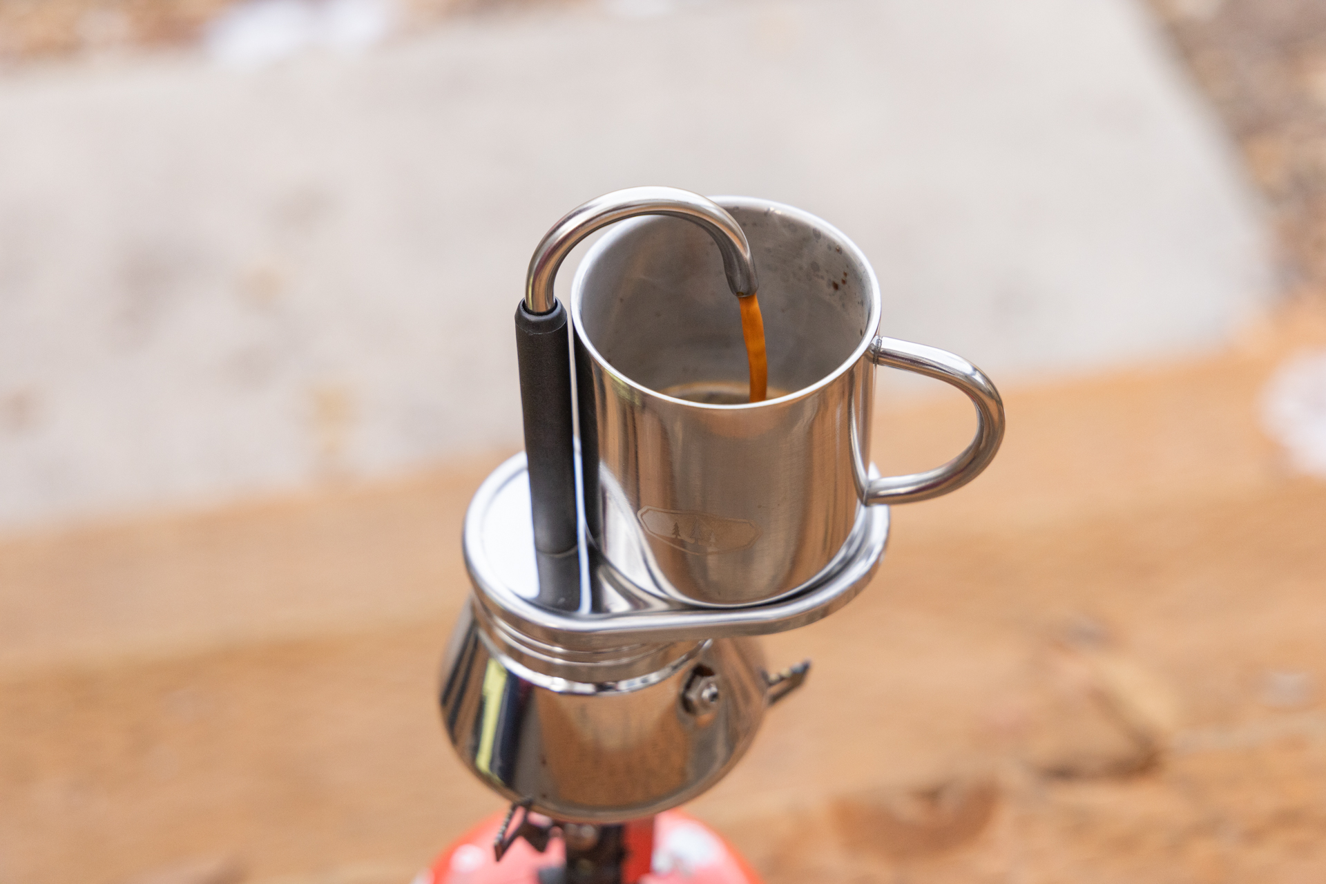 Coffee pouring out of the GSI Mini Espresso.
