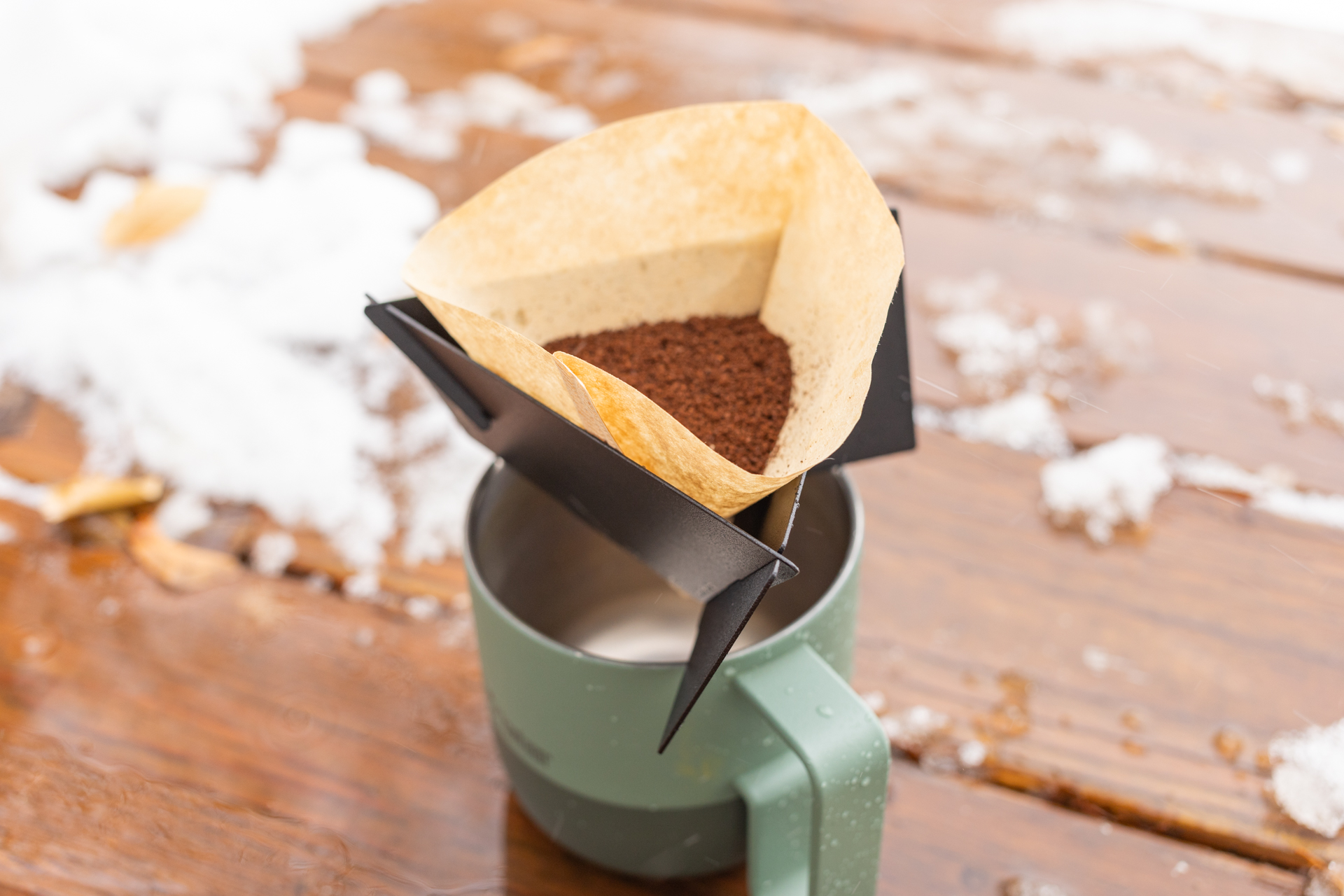 Dry coffee grounds in a filter in the MiiR Pourigami.