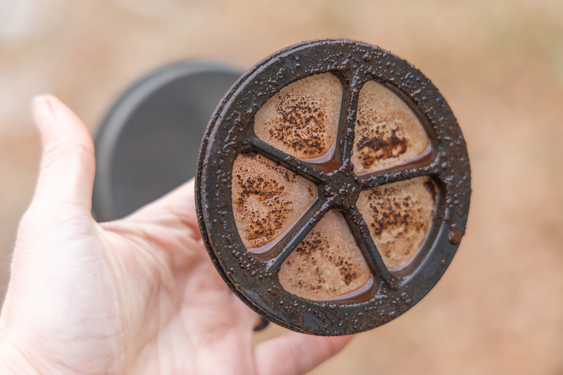 A dirty GSI Java Press covered in grounds.