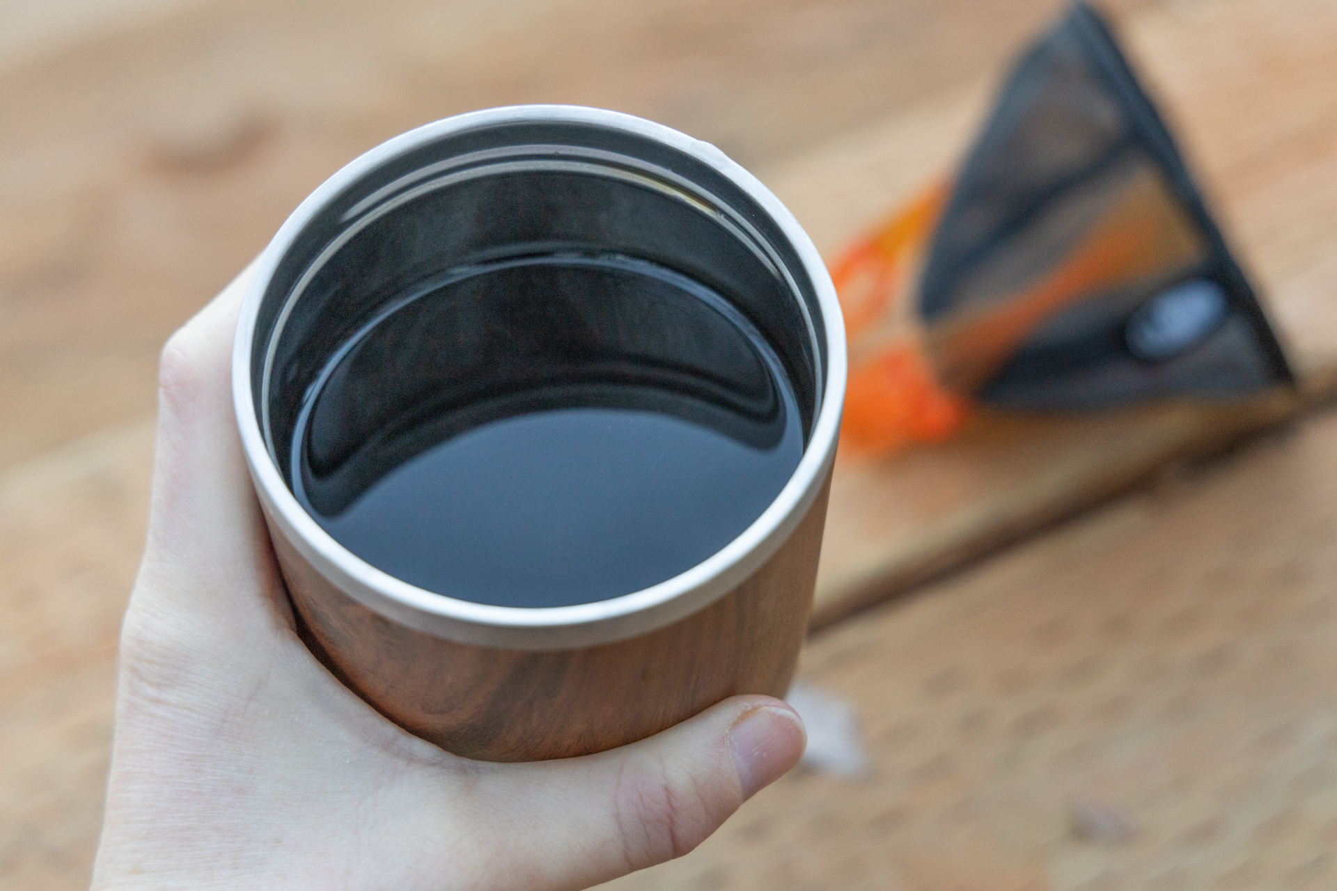 A mug full of coffee.