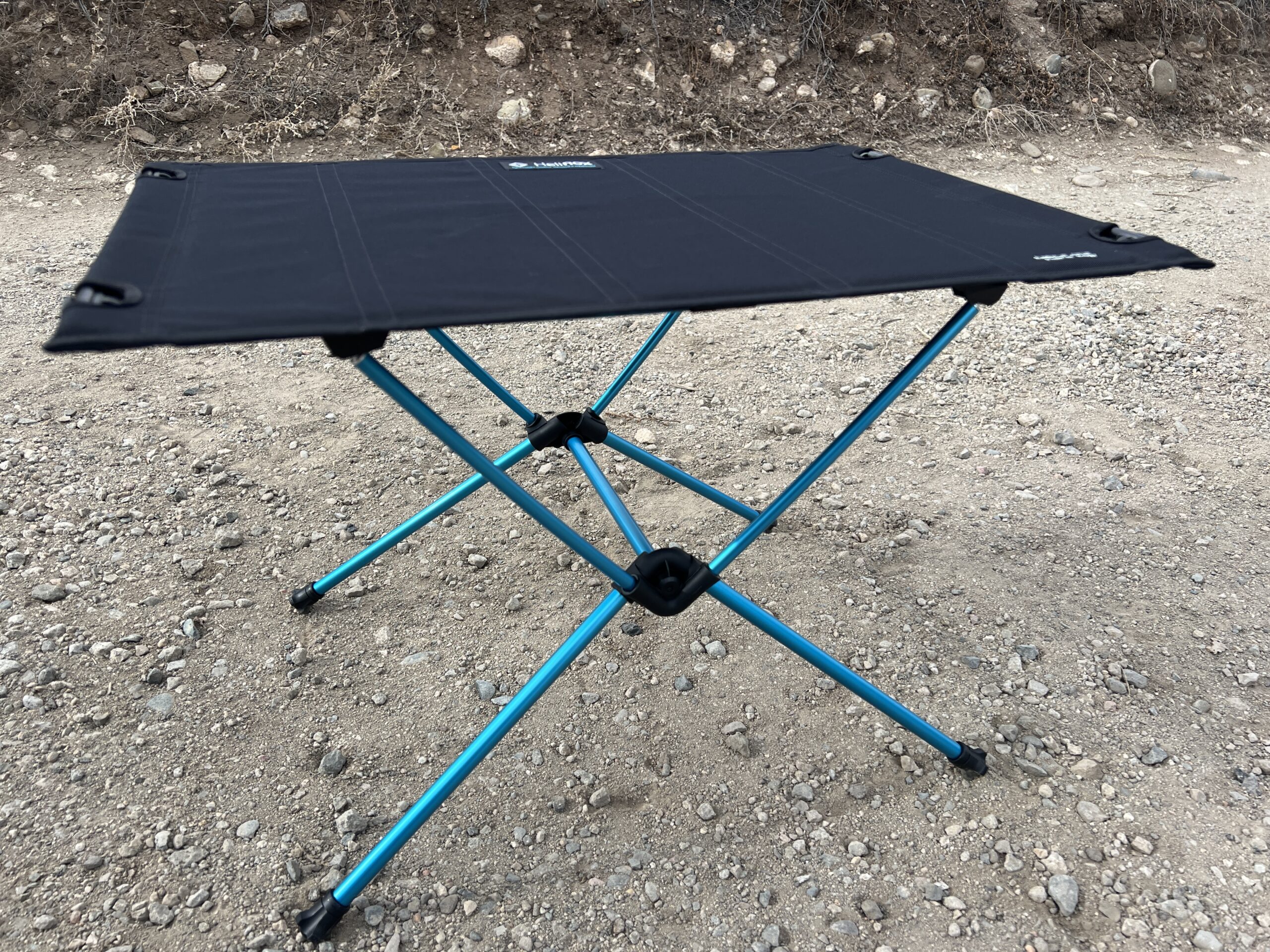 The Helinox One Hard Top stands on dirt.