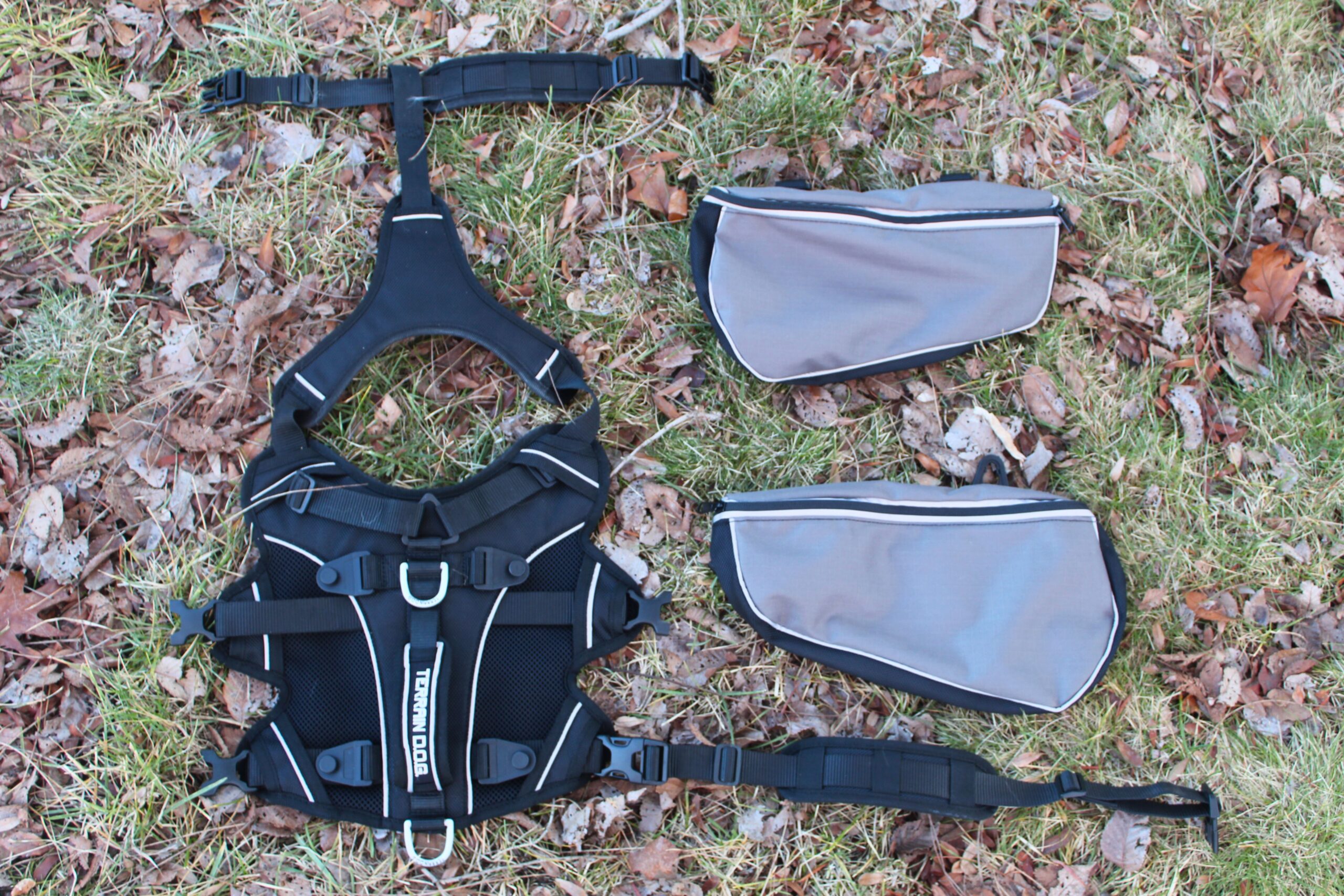 The Terrain Dog Lightweight Adventure Pack laid out on the ground