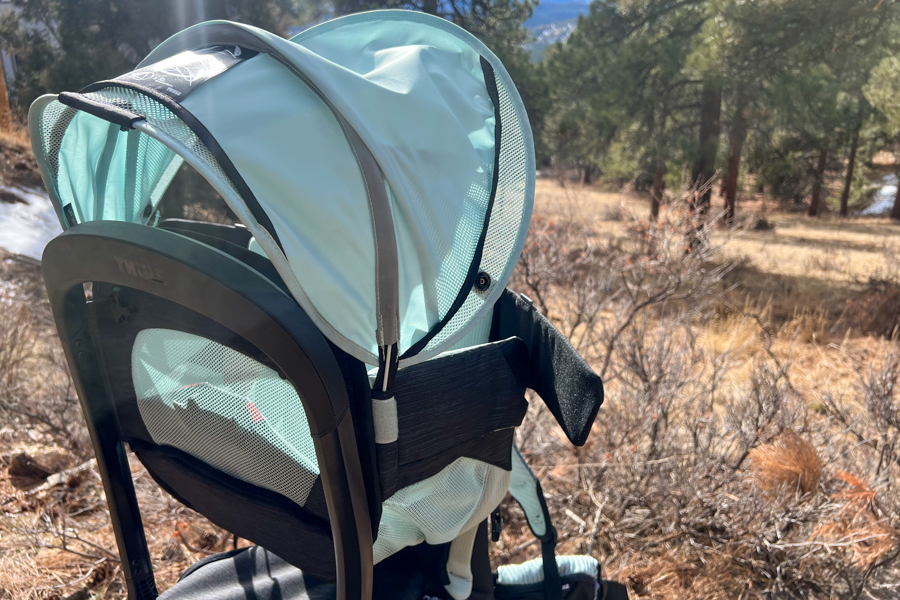Side view of the deployed sunshade on the Thule Sapling, providing UPF 50+ protection.