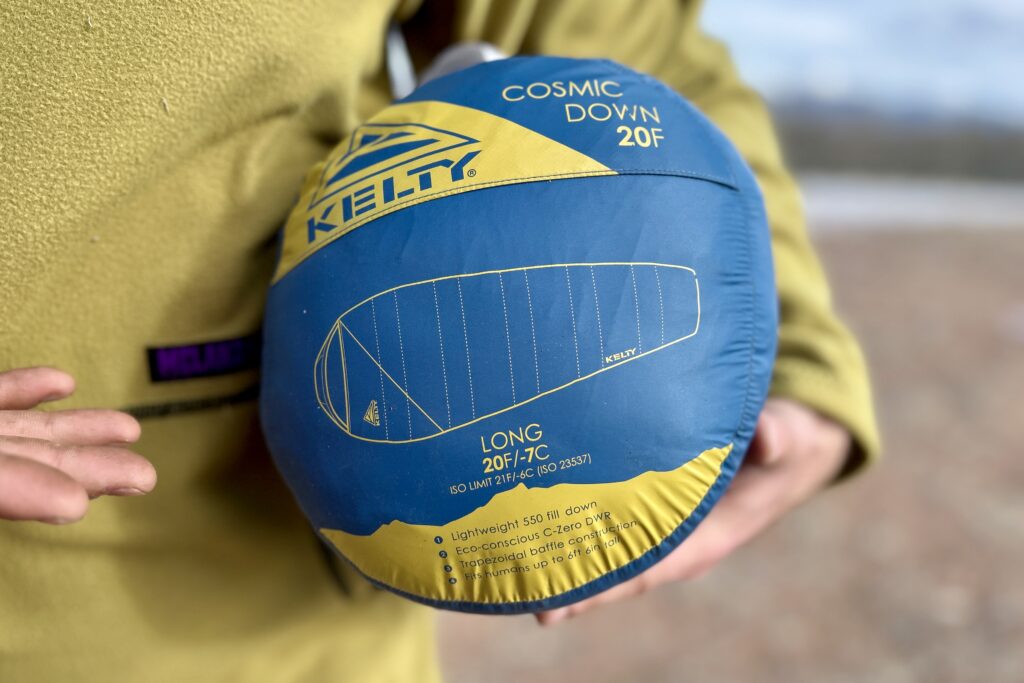 Close-up shot of one end of a sleeping bag in a stuff sack.