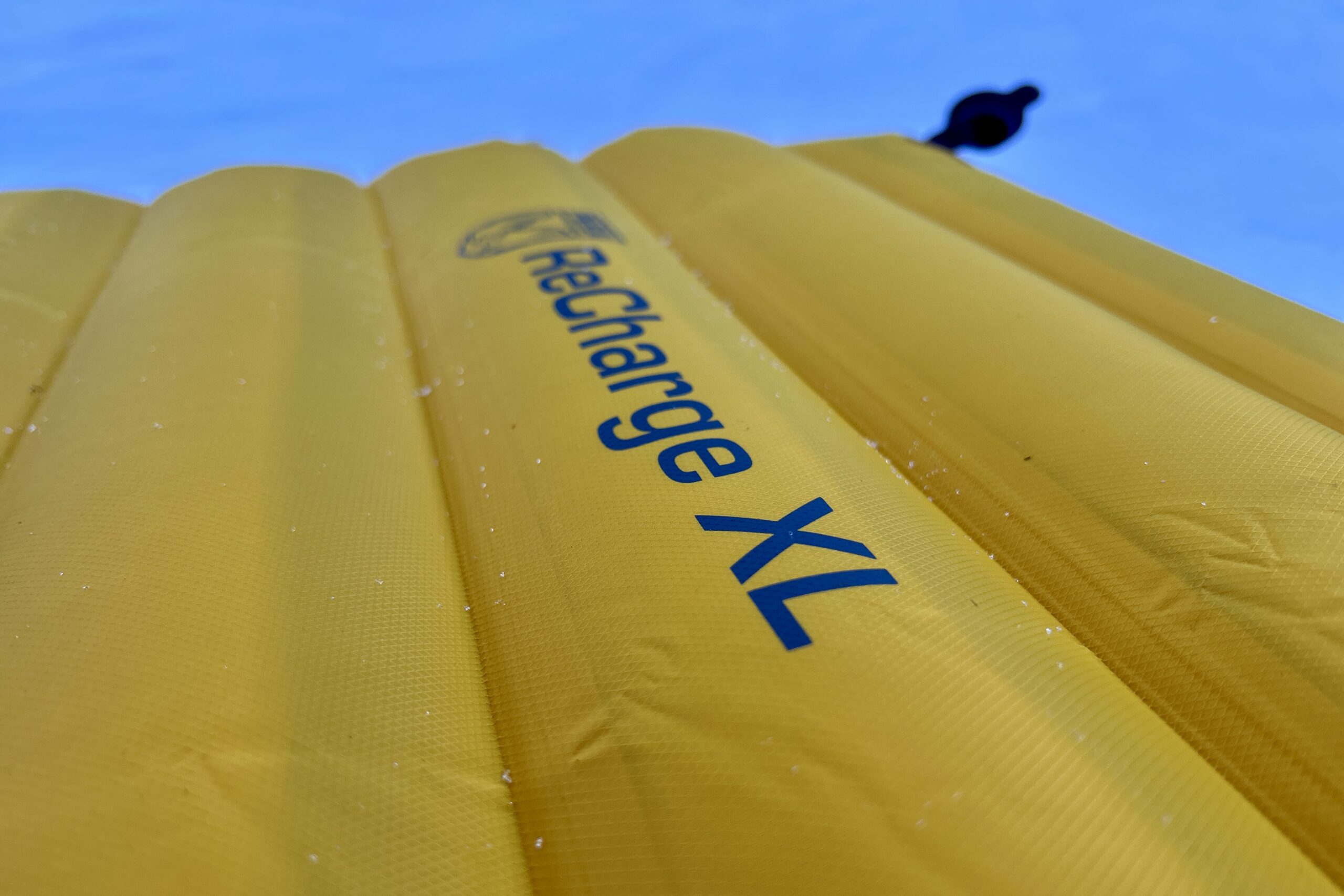 Close-up image of the wide, thick baffles of a camping sleeping pad.