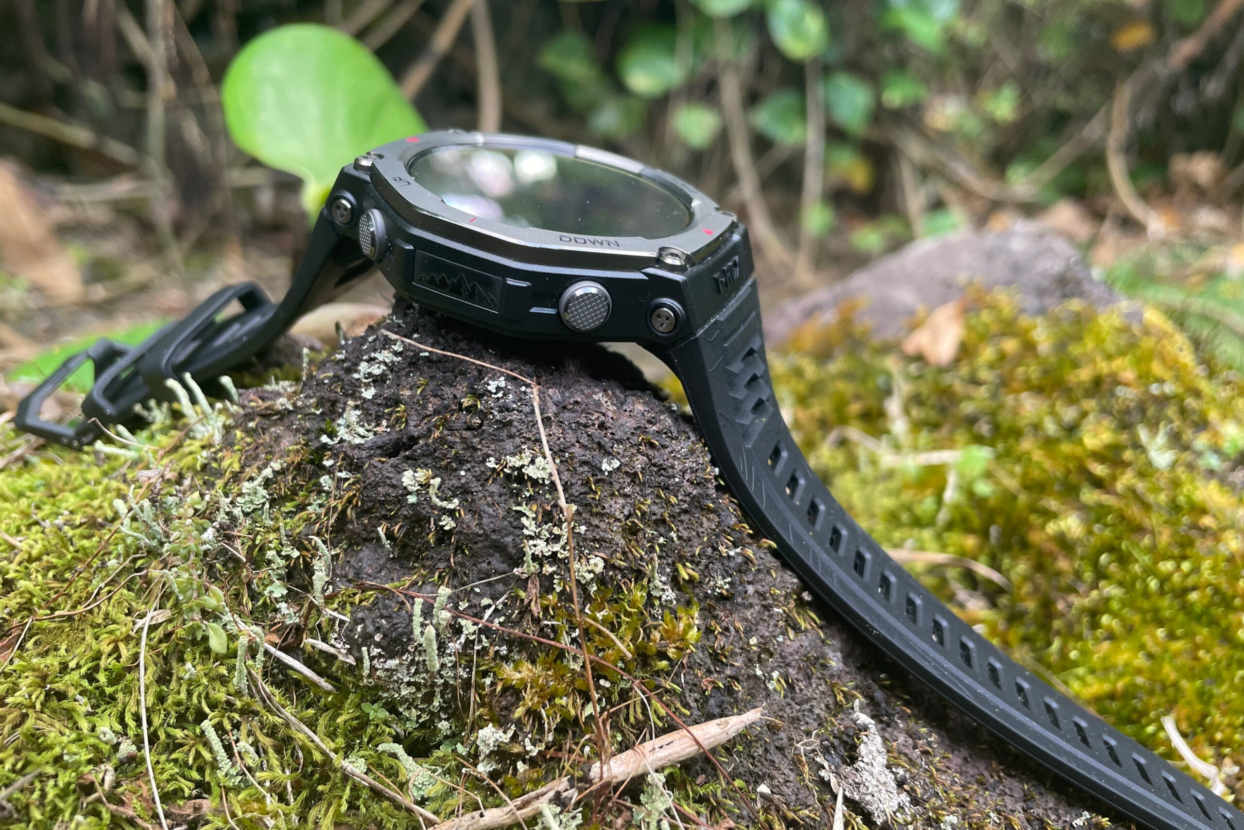 A closeup of the watch strap of a GPS watch.