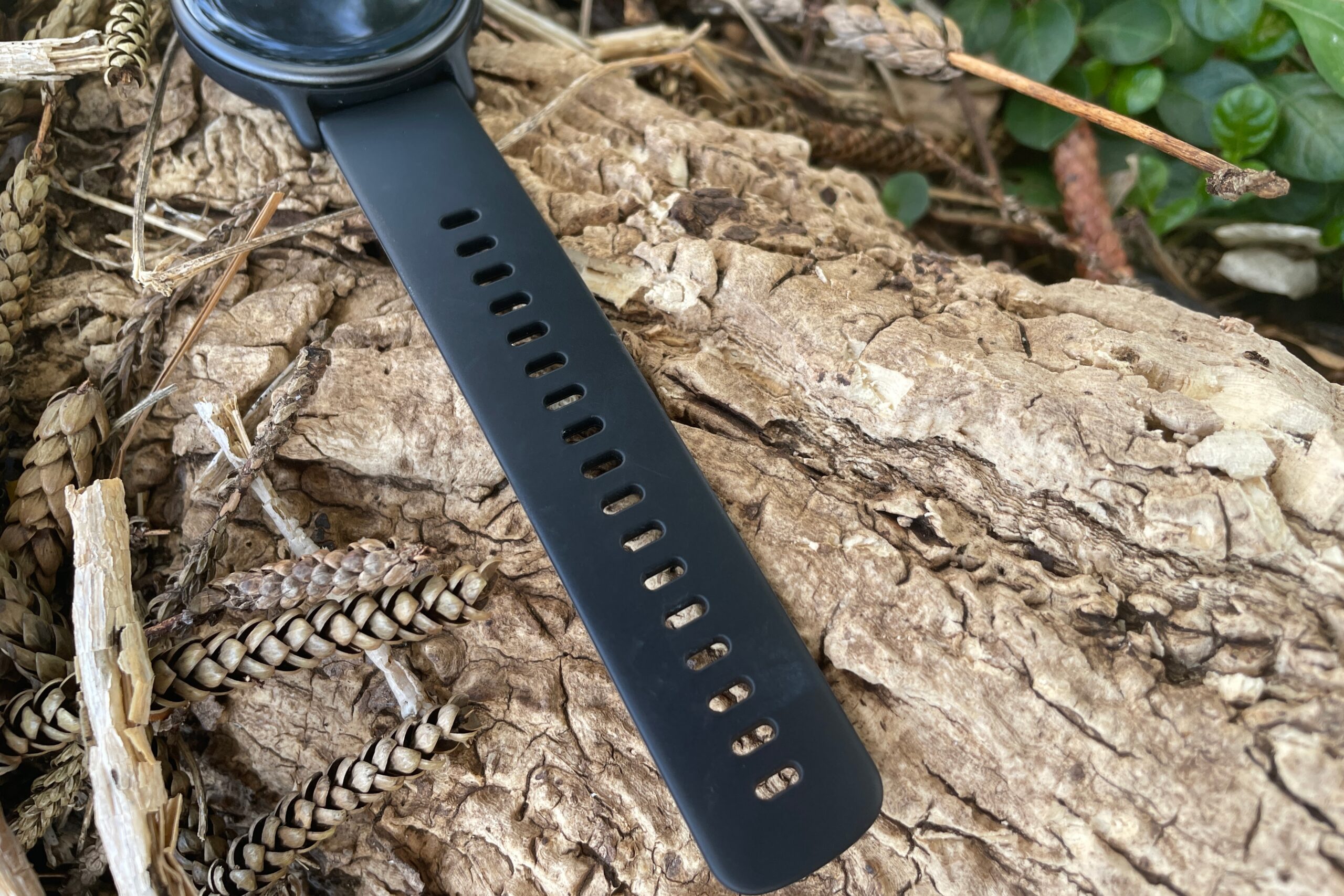 A closeup of the strap of a watch.