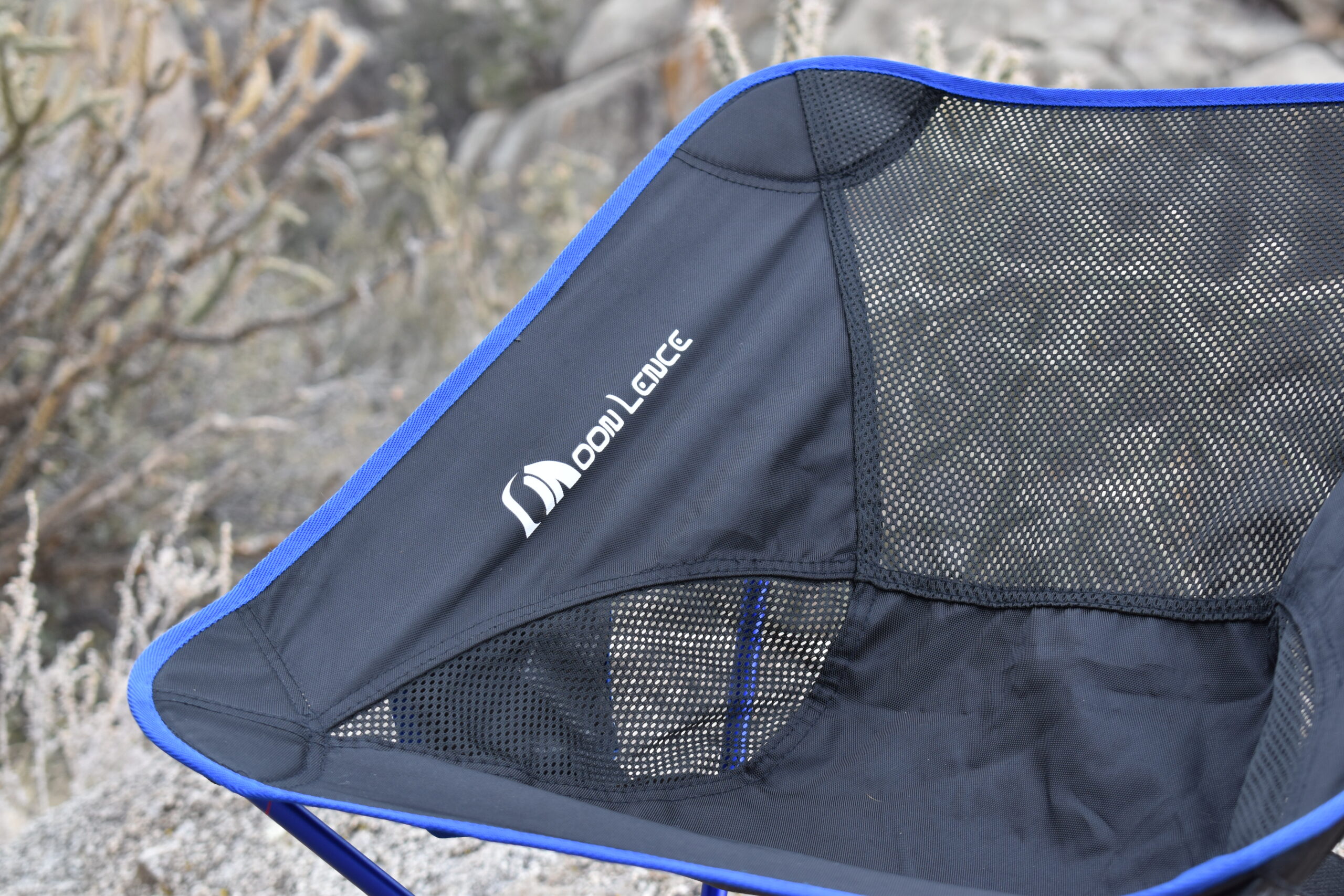 close up of the aerating mesh on the seat fabric of the Moon Lence chair