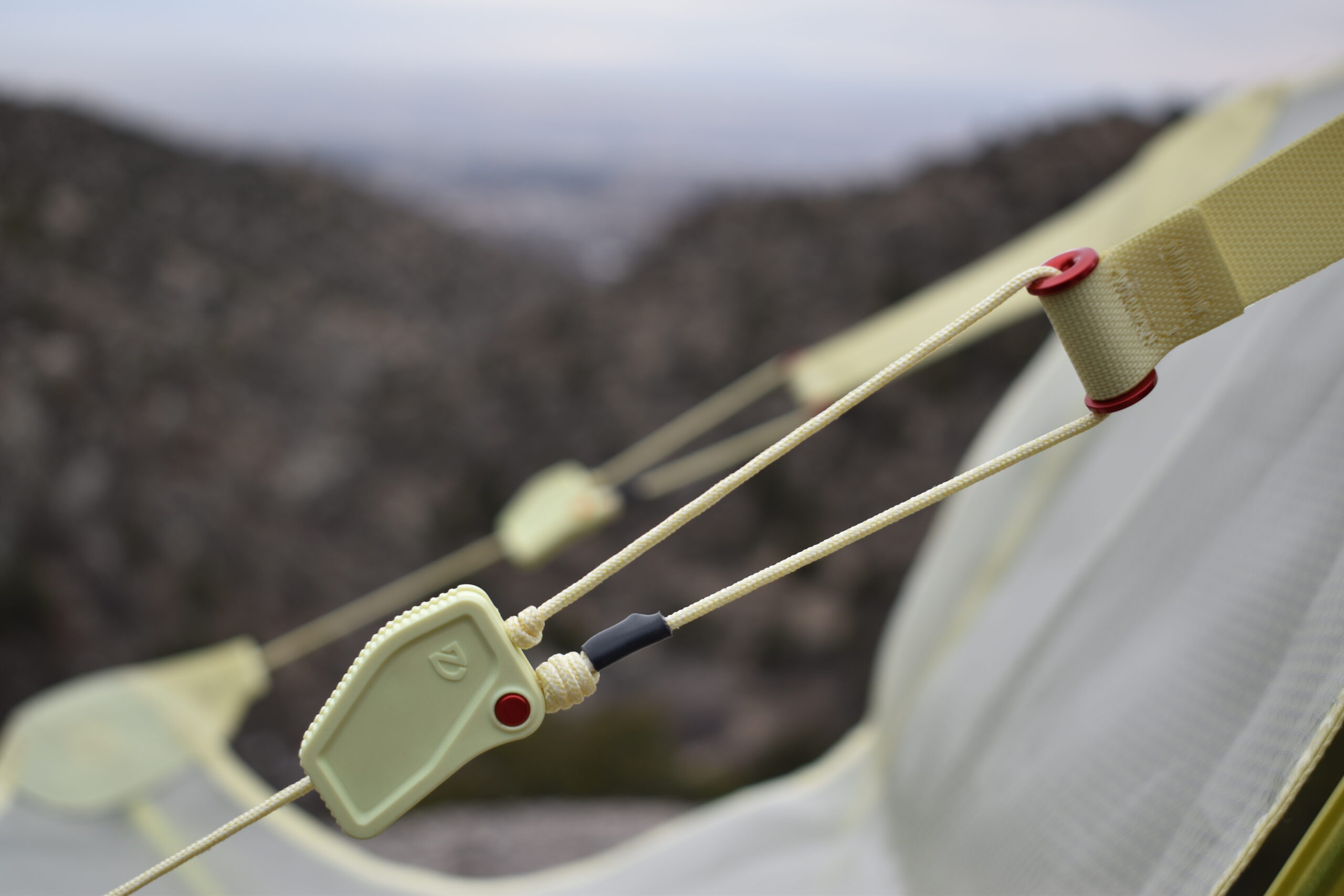 close up of the adjustable tabs on the arms of the chair, which allow you to adjust your sitting position