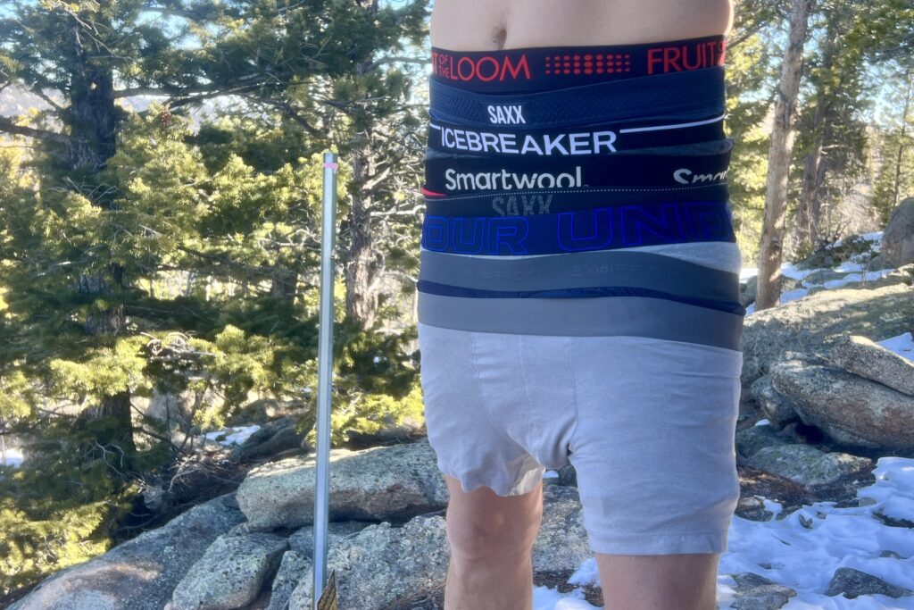 A guy wearing many pairs of underwear