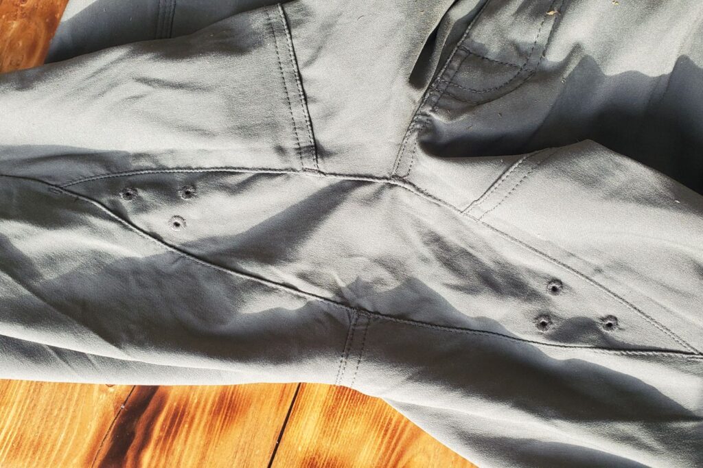 A closeup of the crotch on a pair of hiking pants.