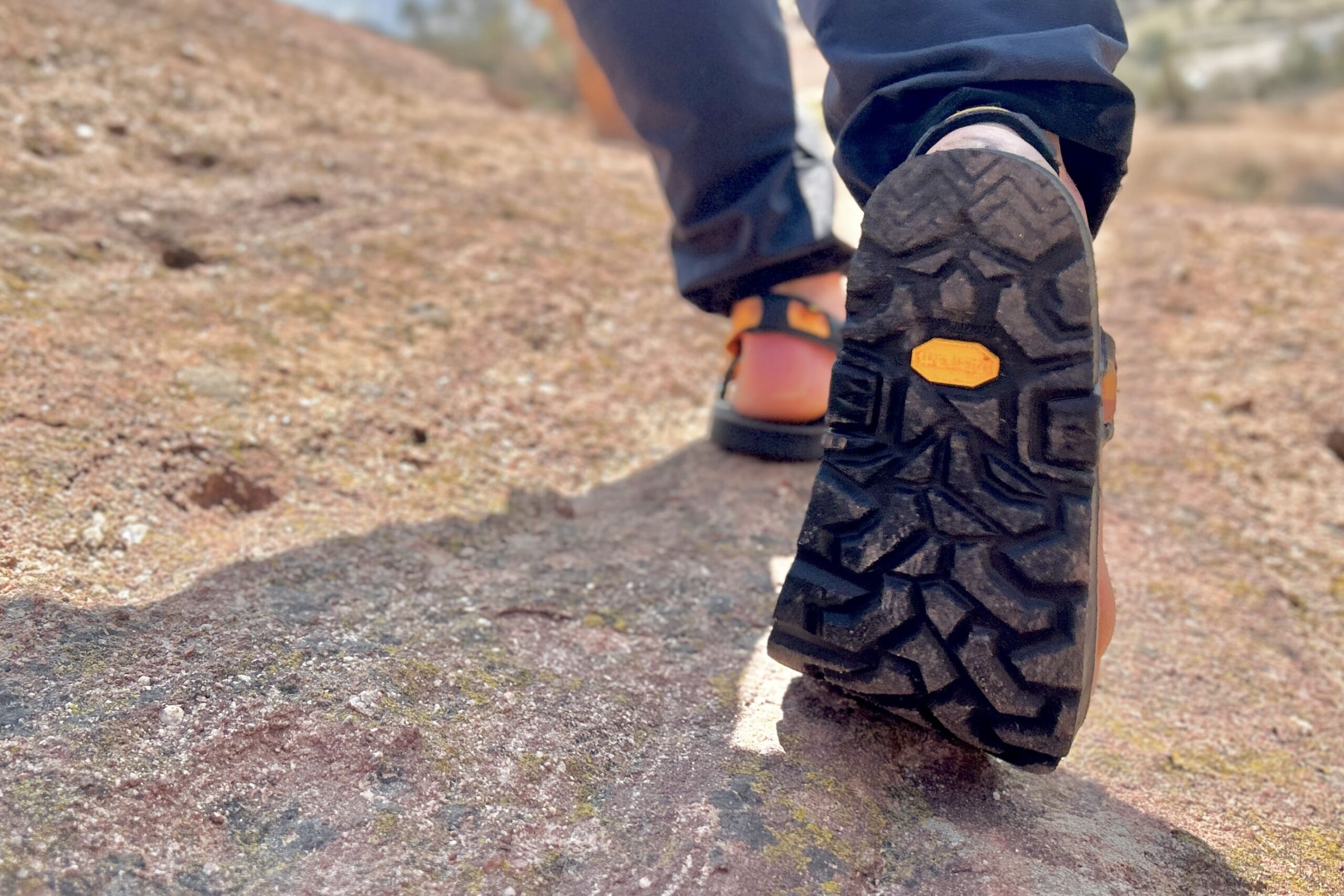 Close up image of the bottom of a hiking sandal, showing off the traction.