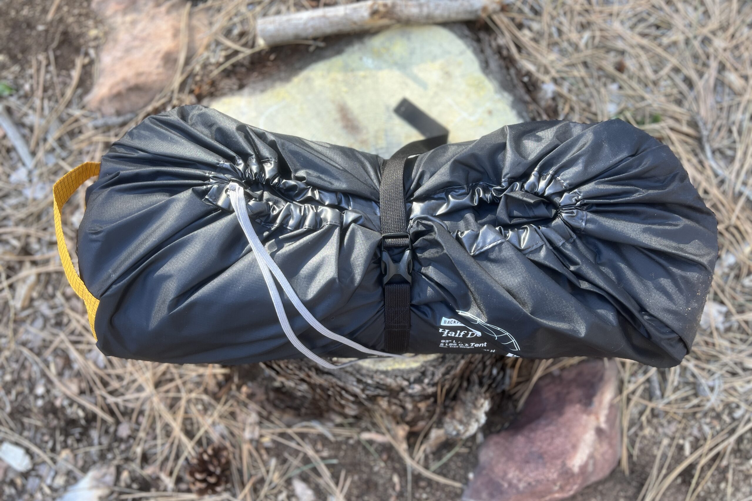 a tent stuff into it's storage sack
