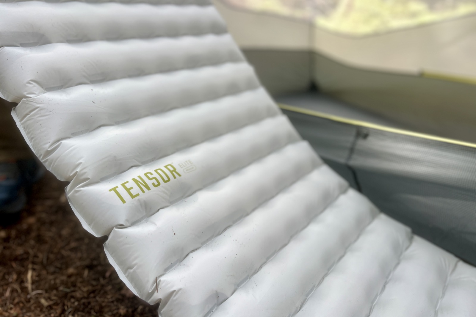a closeup of a gray sleeping pad