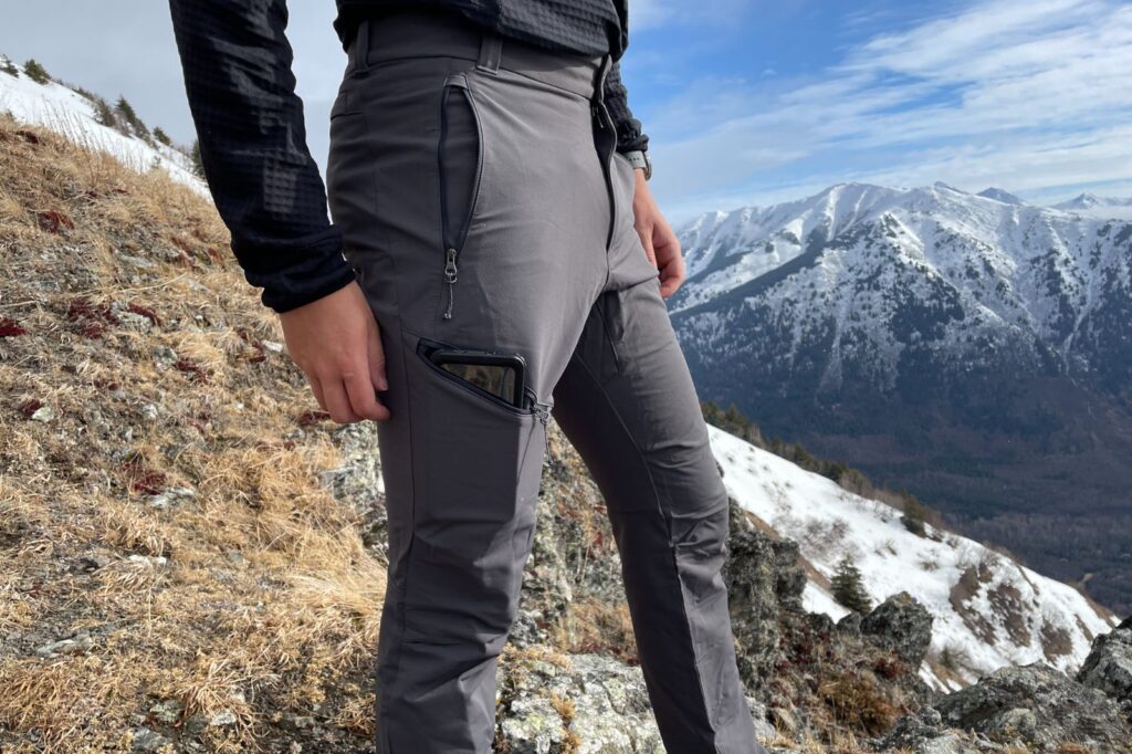 A closeup of the side pocket on a pair of hiking pants.