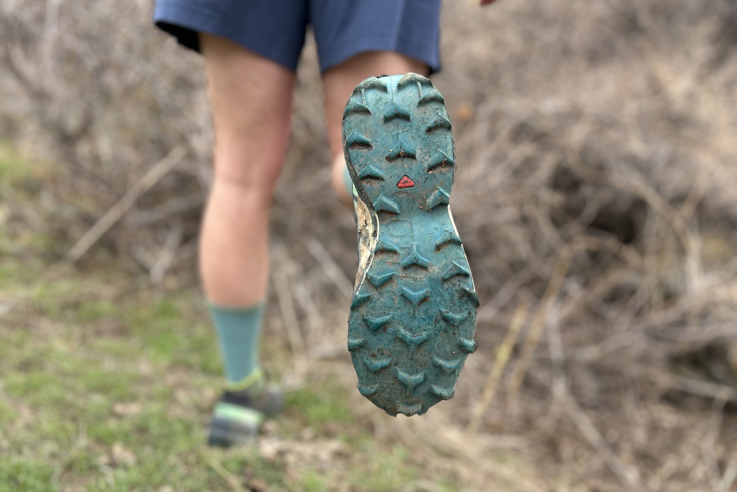 Close up of the traction pattern on a pair of shoes.
