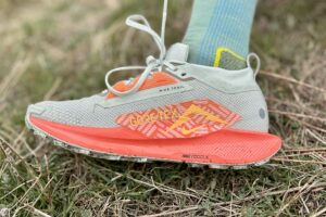 Close up of a trail running shoe from the side.