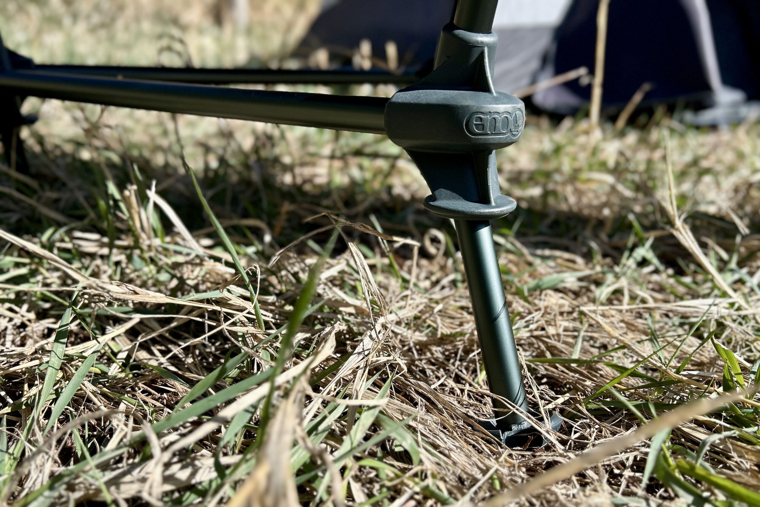 Close up image of the support beam at the bottom of a camping chair.