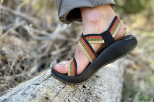 Close up image from ankle down of a person's foot in a sandal