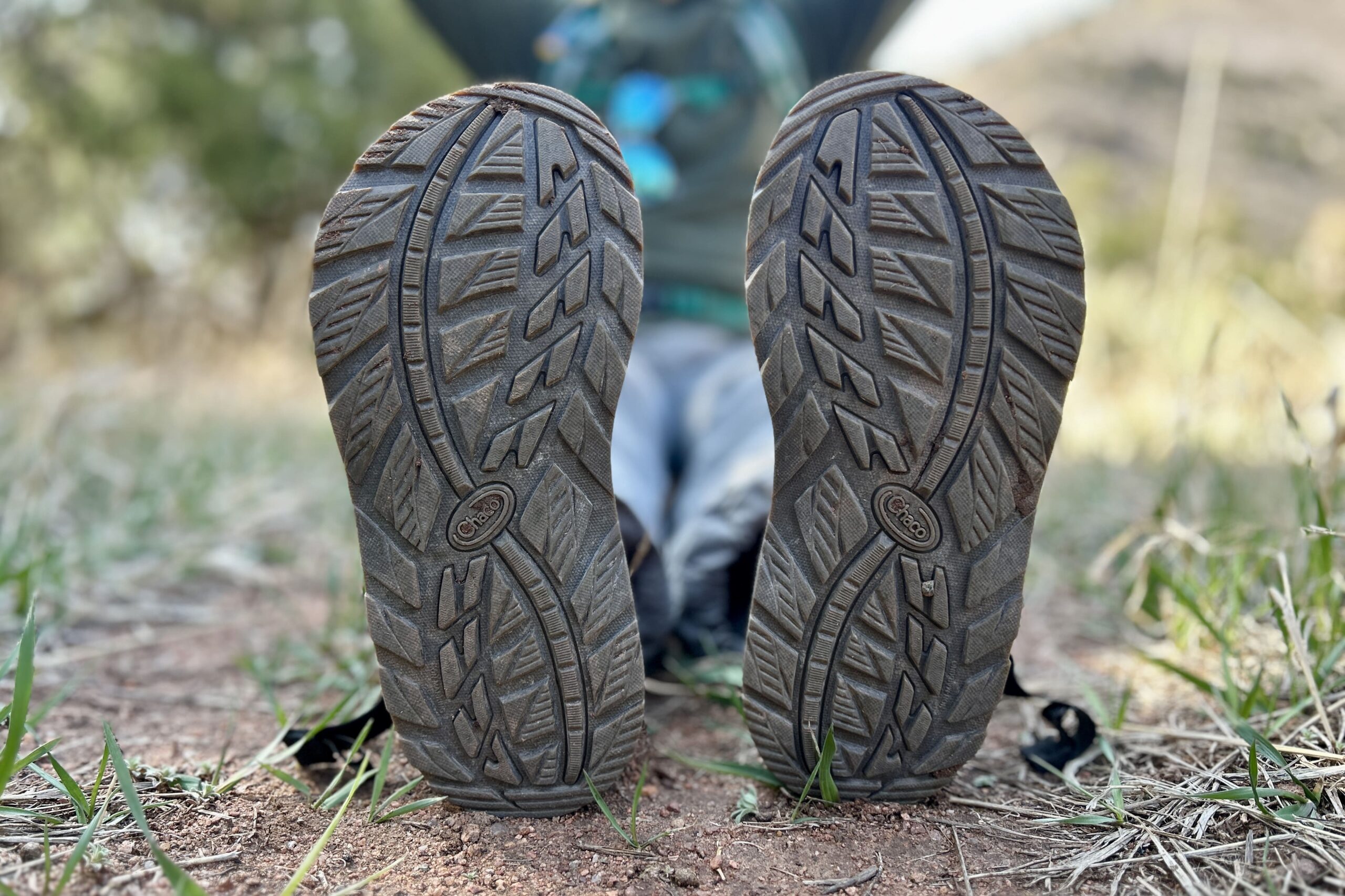 Close up image of the bottom of a pair of hiking sandals, showing off the traction