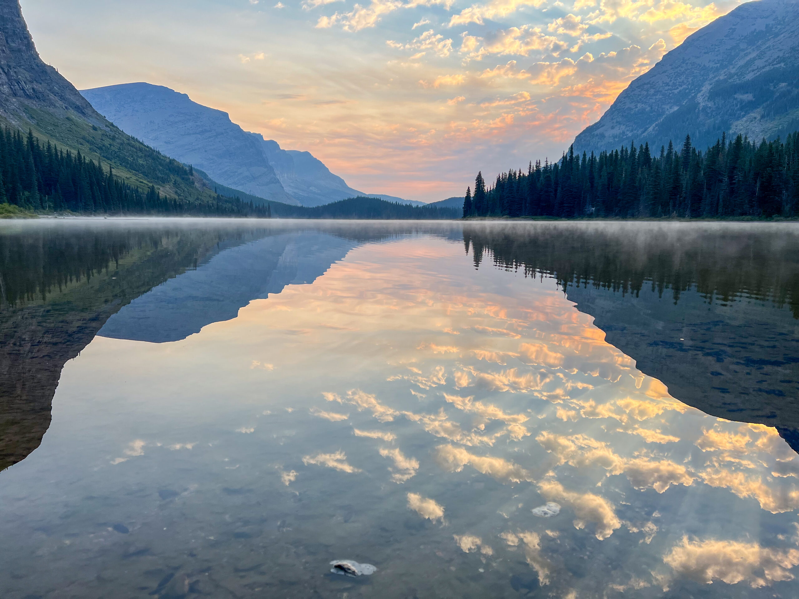 a view of lake josephine during sunrise