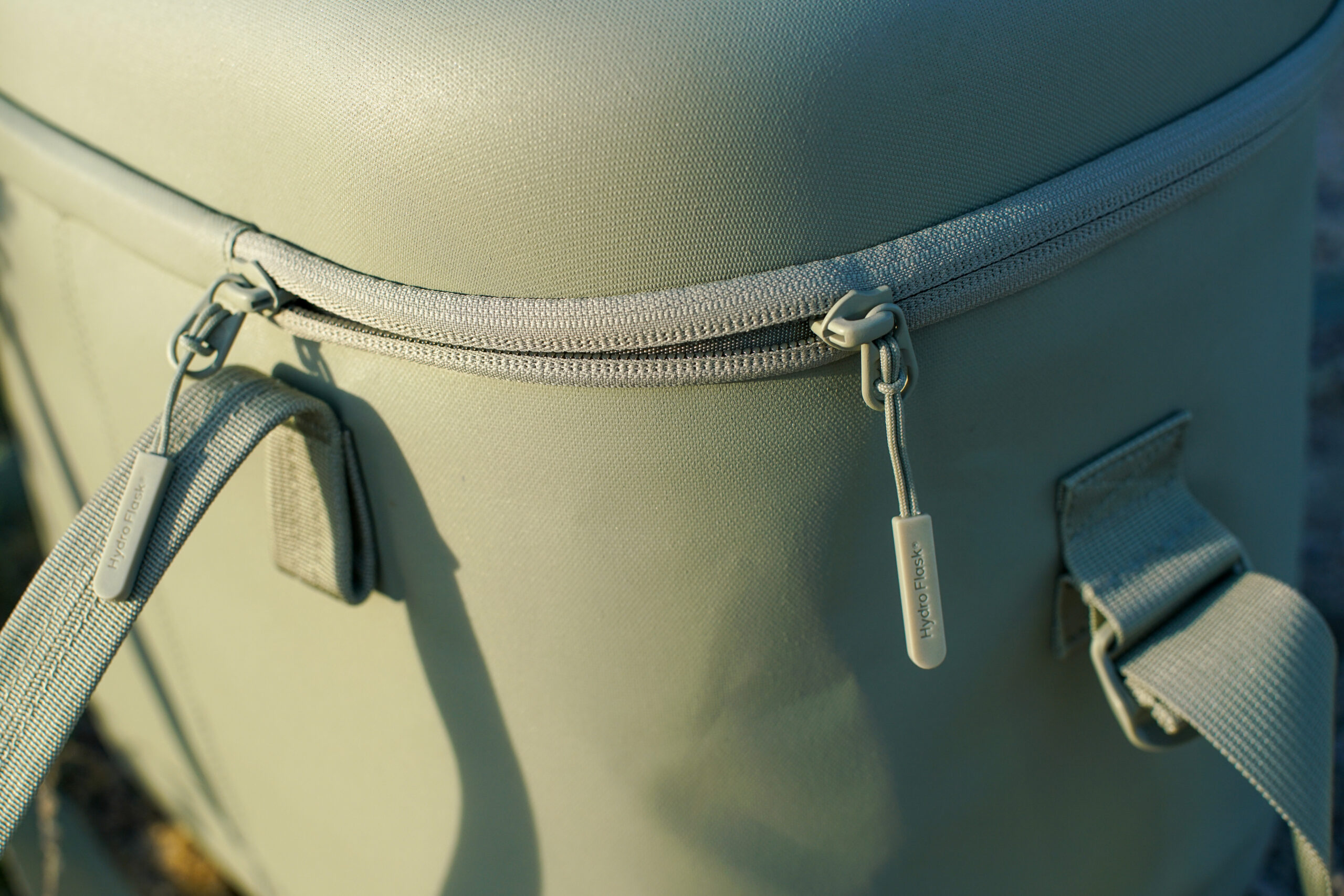 A close up of the zipper pull on the Hydro Flask Carry Out 20L cooler.