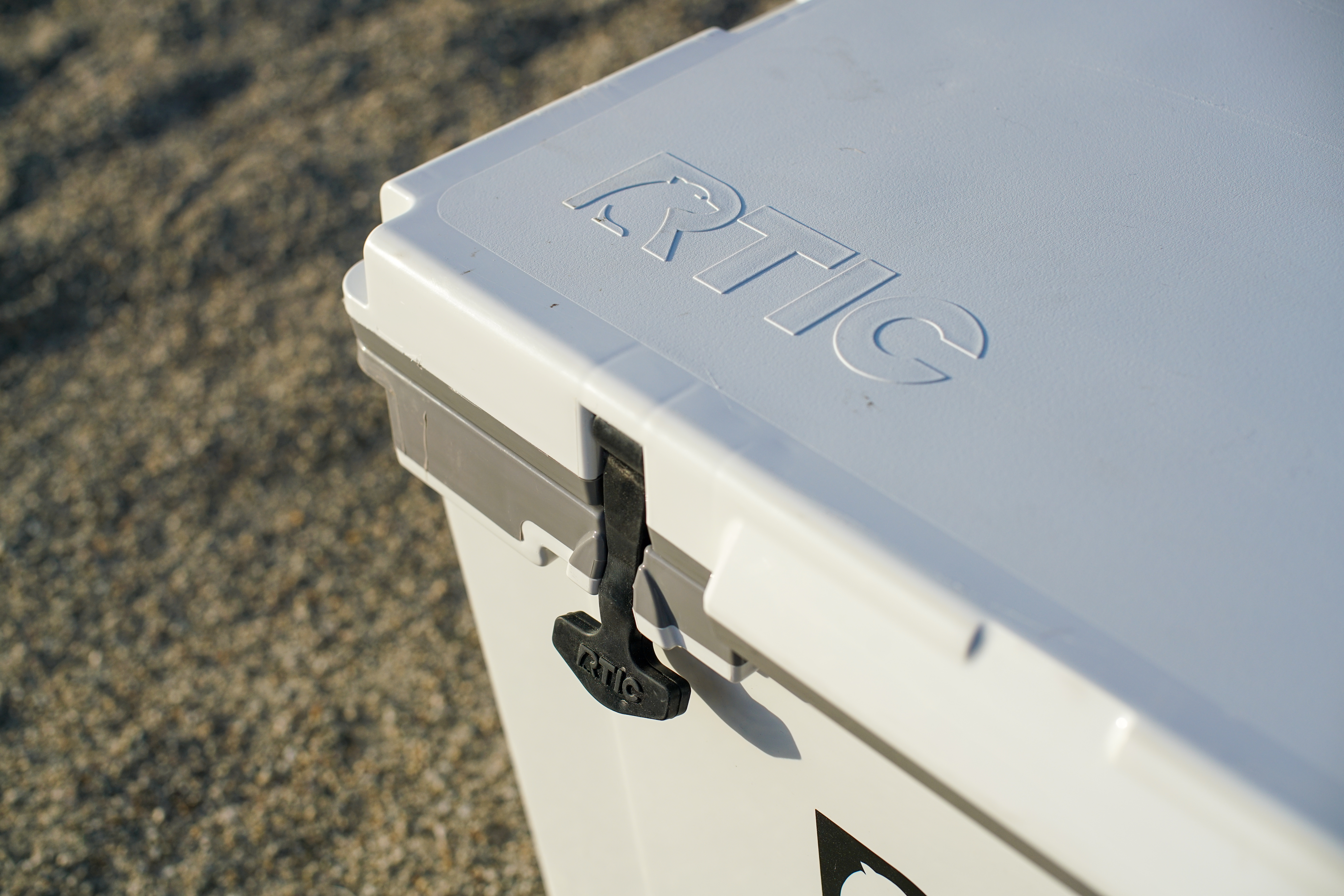 A close up of the RTIC Ultralgiht 52's corner, focusing on one of its t-latches.